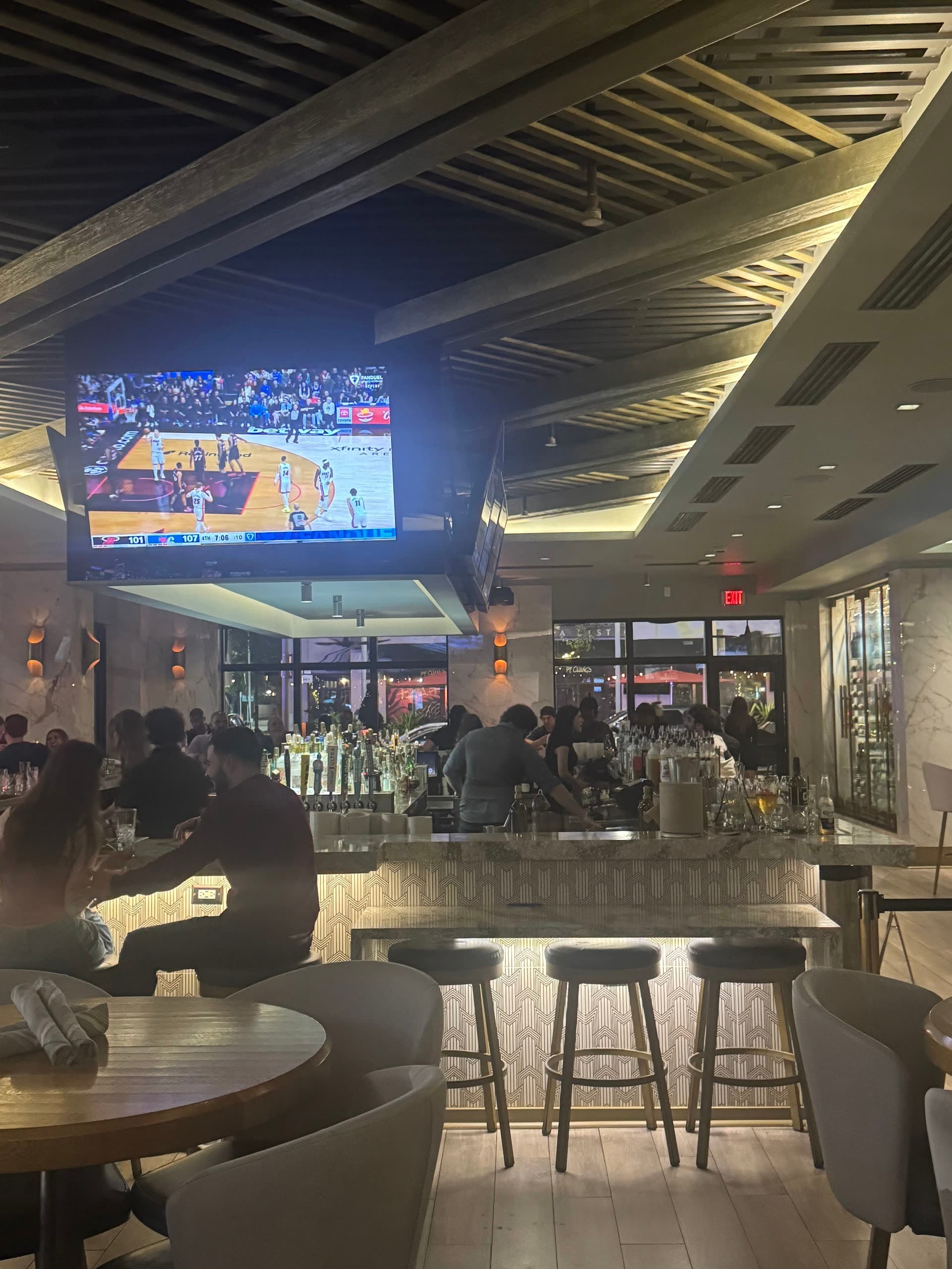 Moxies Miami restaurant interior with bar and dining scene
