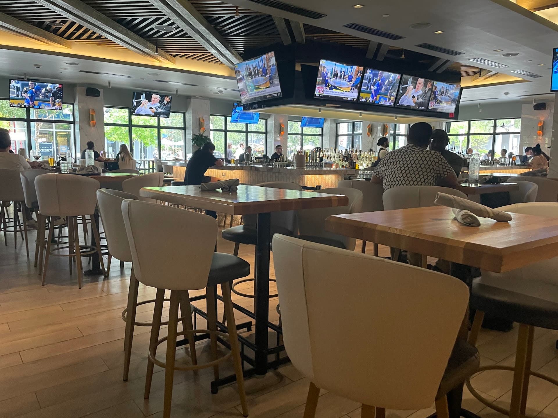 Moxies Miami Restaurant interior with bar and seating