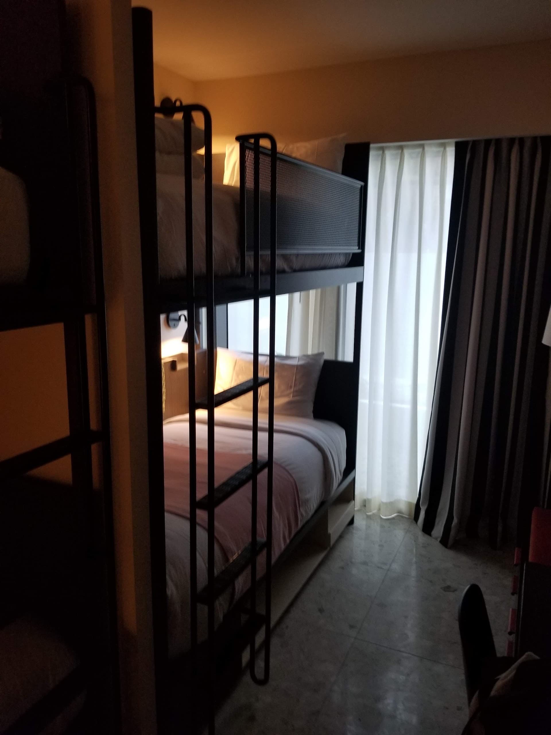 Cozy guest room at Moxy Miami Beach