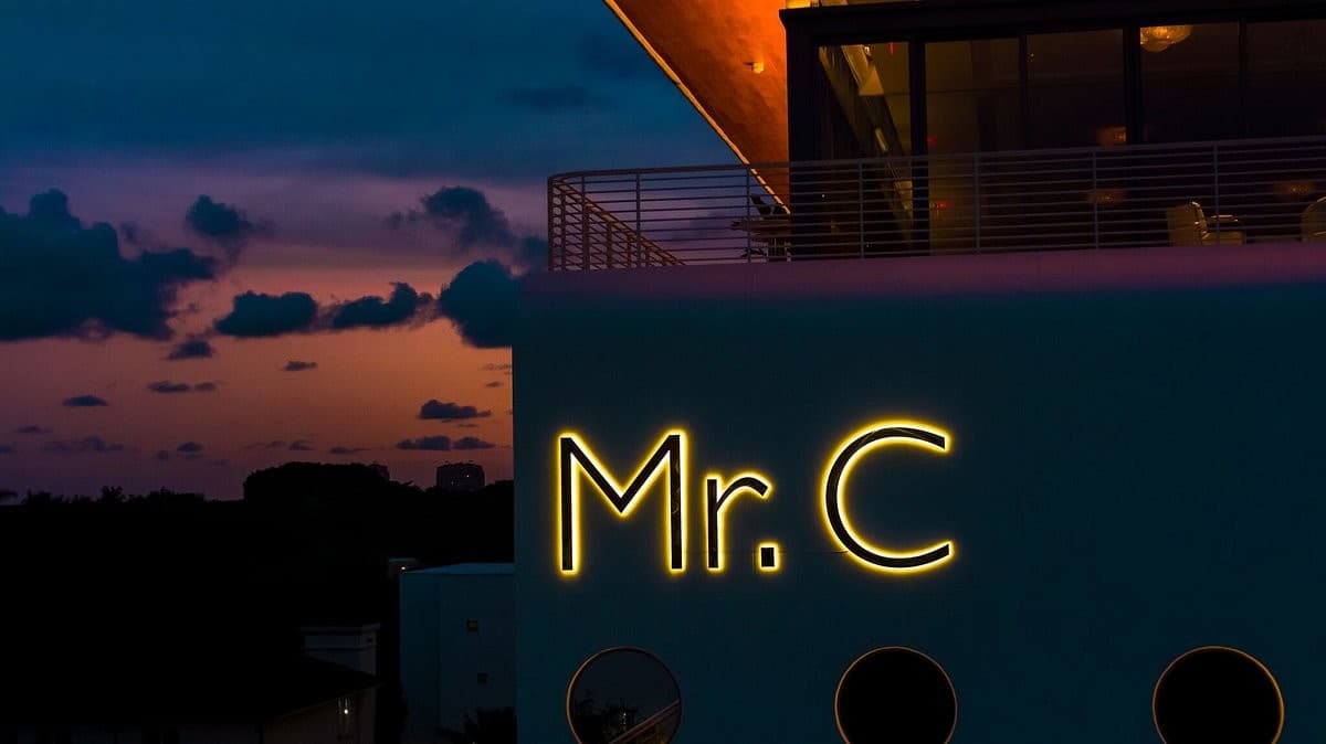 Mr. C Miami signage in Coconut Grove at dusk