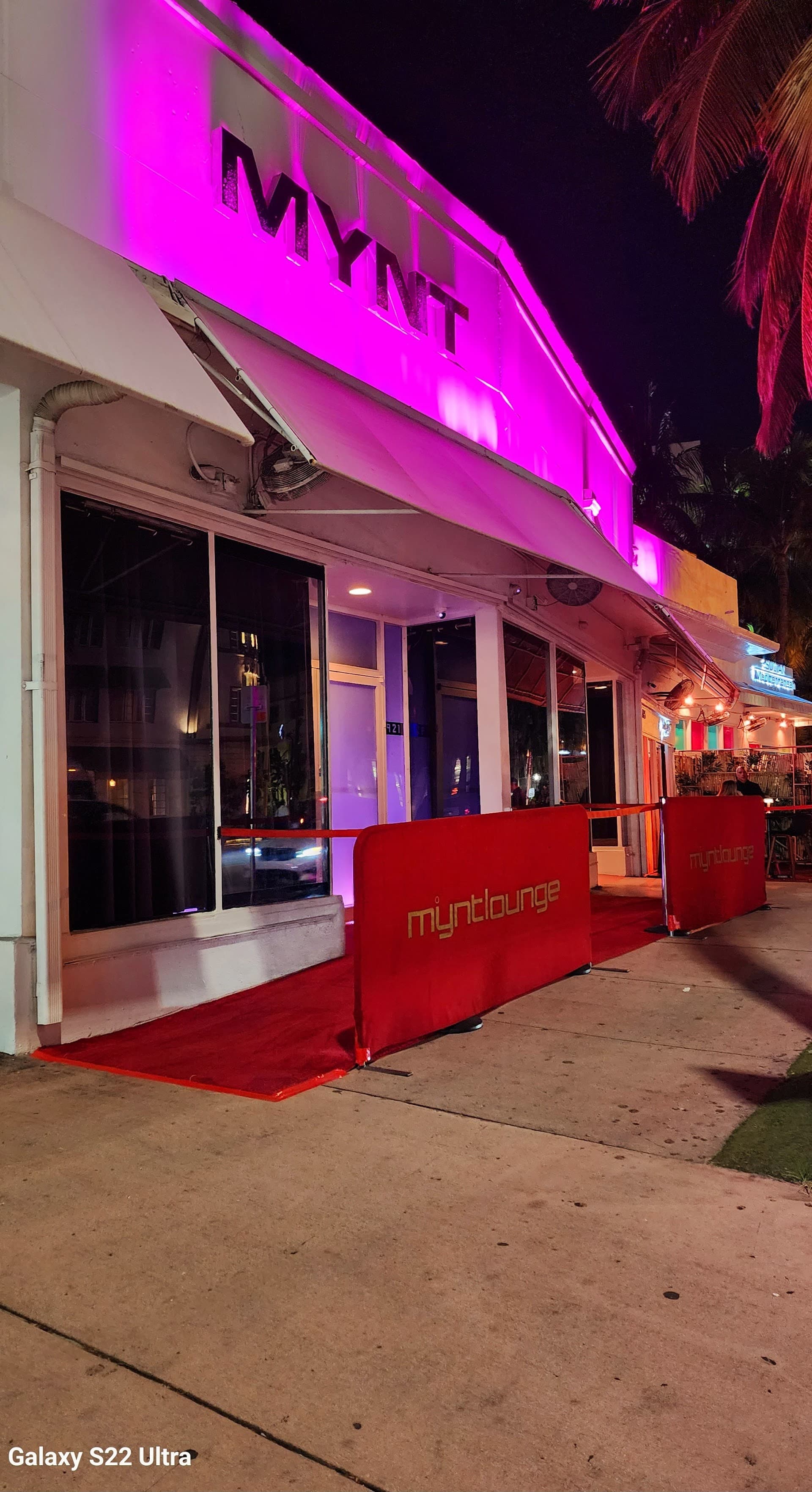 Mynt Lounge entrance at night in Miami Beach