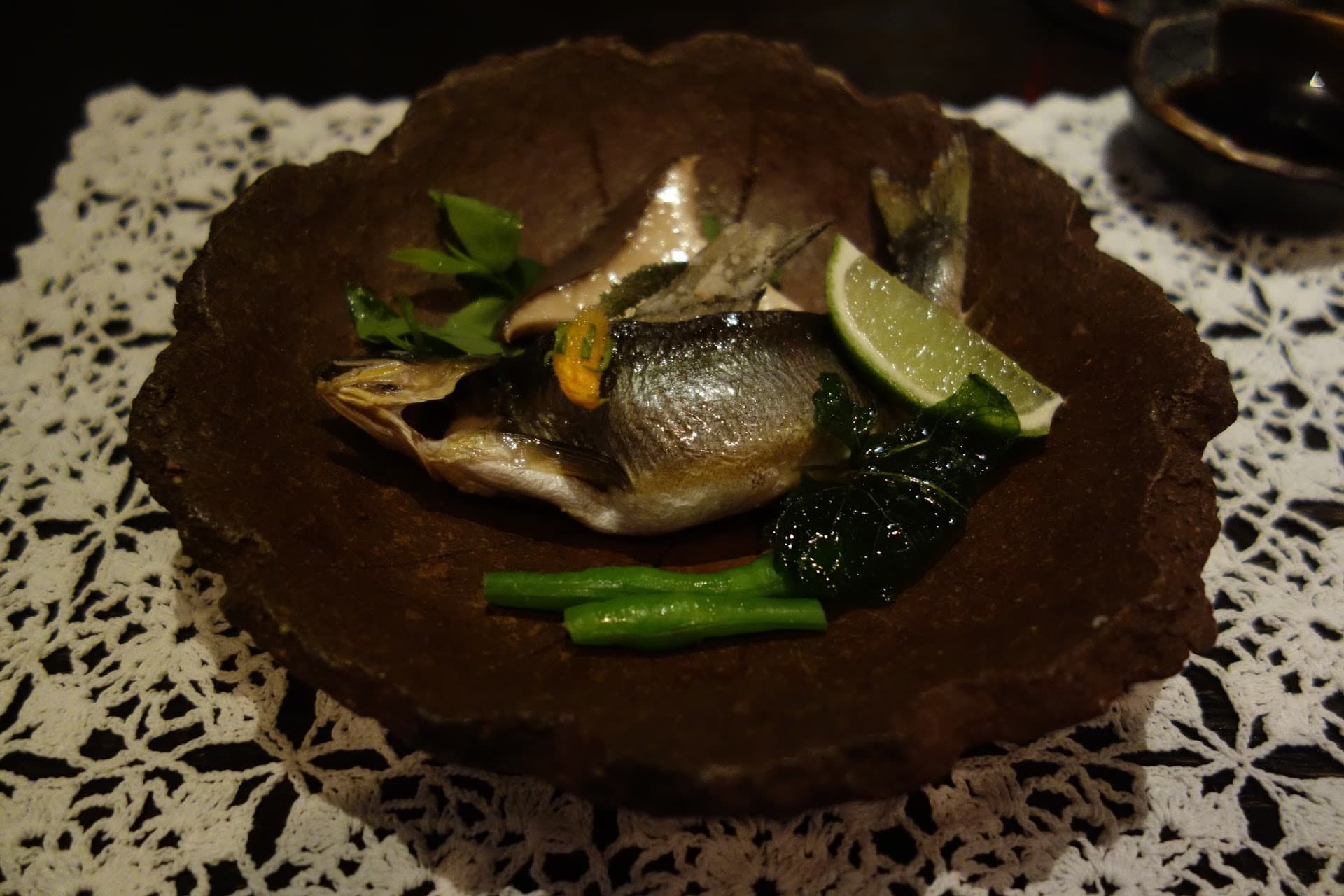 Gourmet dish at NAOE in Miami featuring fish