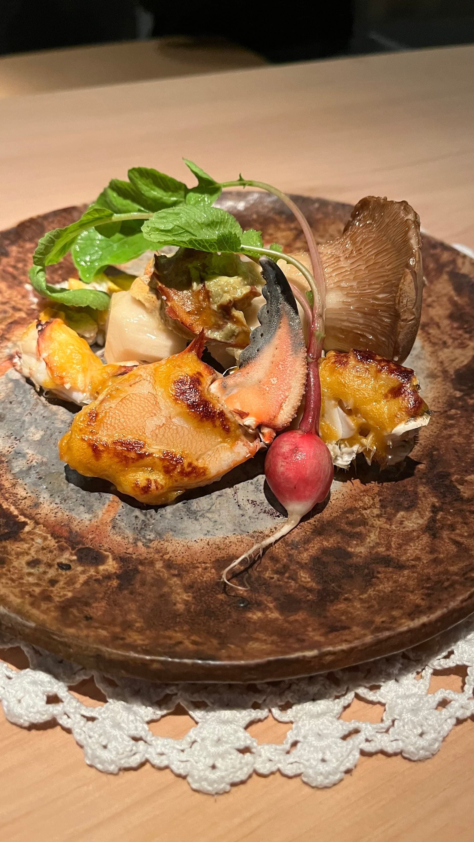 Grilled seafood dish from NAOE in Miami