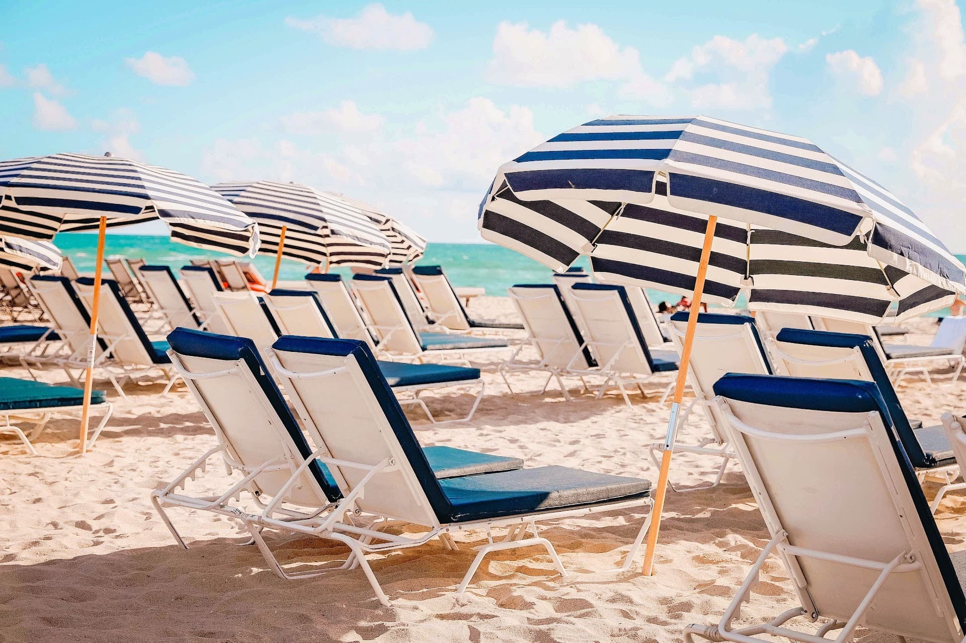Beach chairs and umbrellas at Nautilus Sonesta Miami Beach