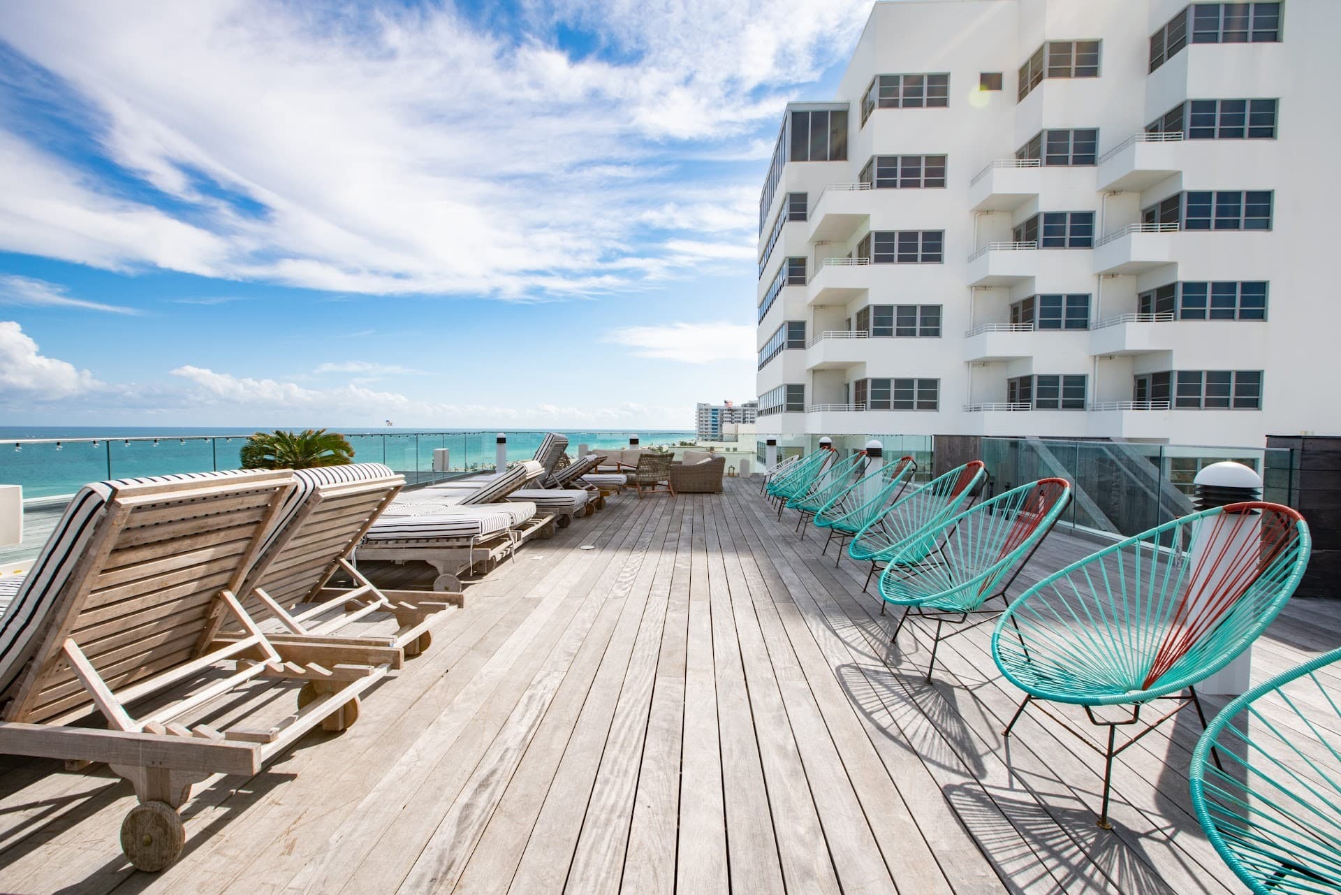 Nautilus Sonesta Miami Beach pool area with lounge chairs