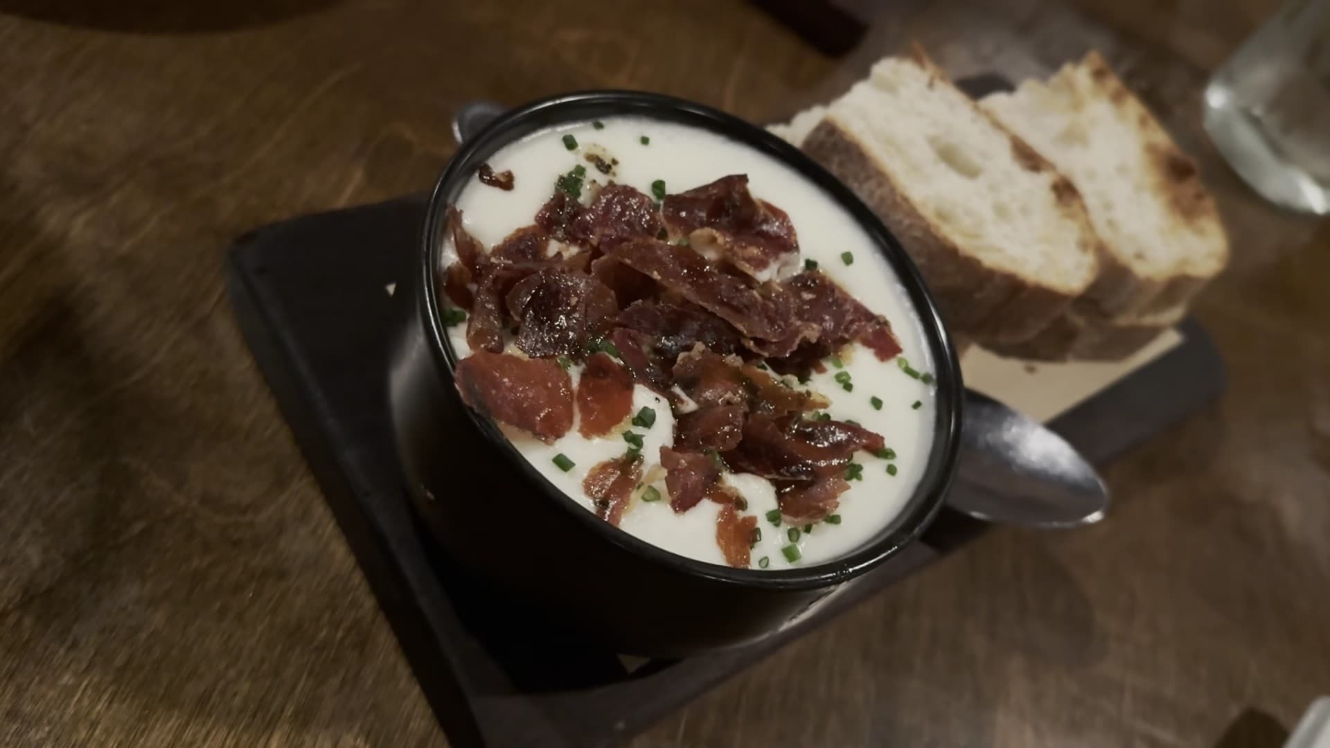 Creamy dish with bacon at Niu Kitchen in Miami