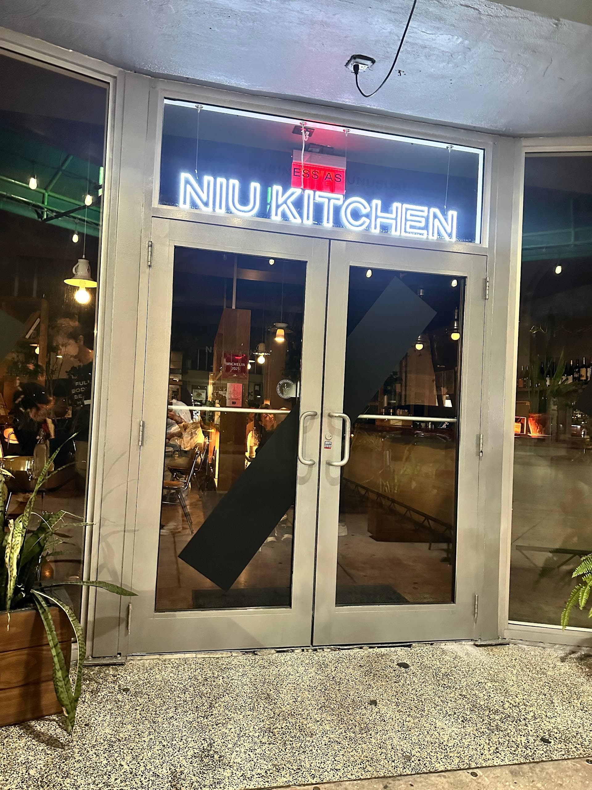 Entrance of Niu Kitchen restaurant in Miami