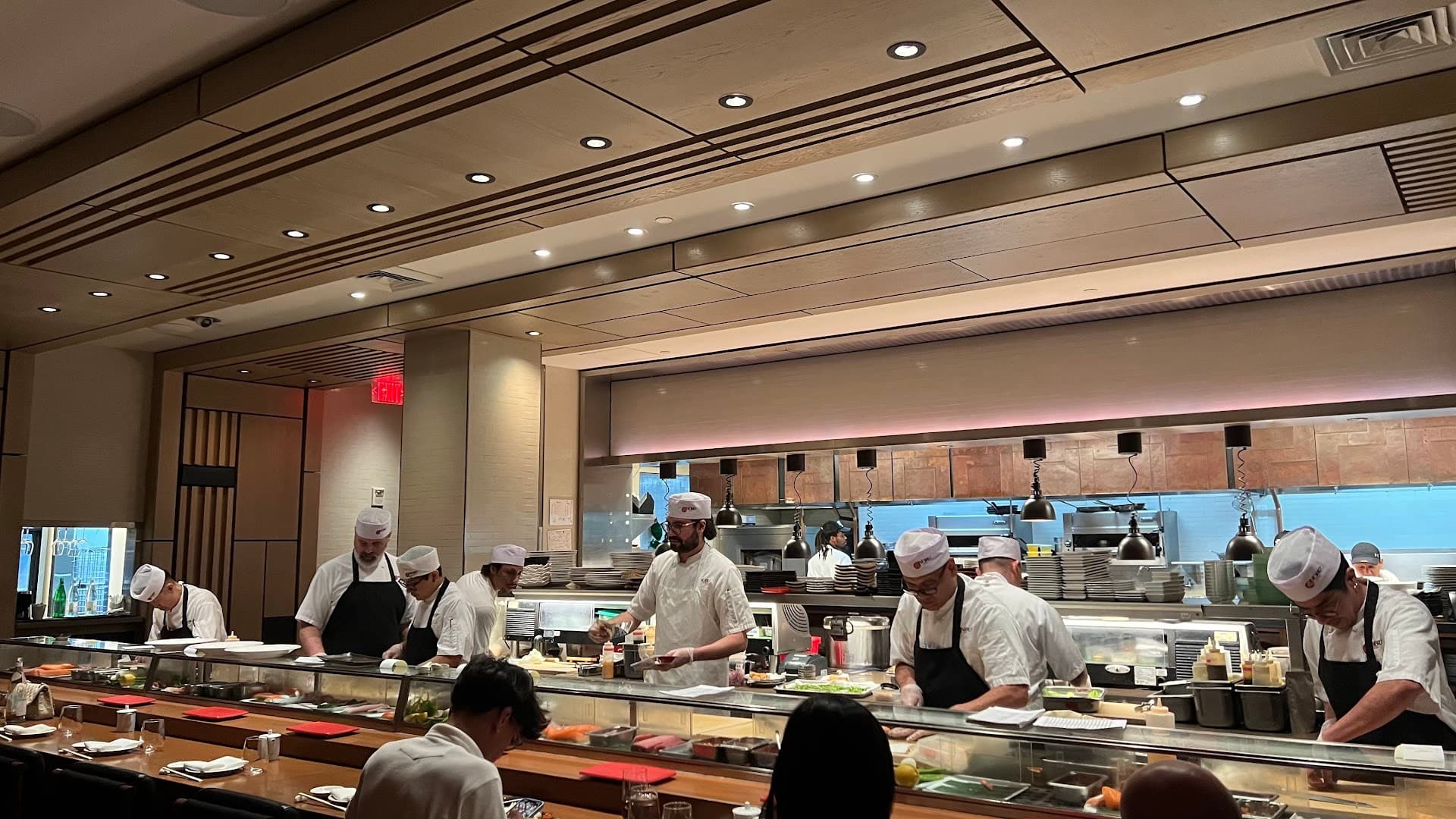 Nobu Miami dining scene with chefs at work