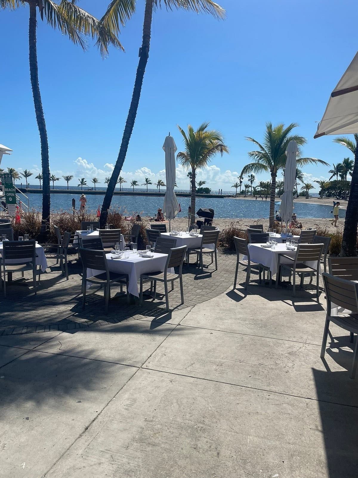 Outdoor dining area at NOMA Beach by Donatella in Coral Gables