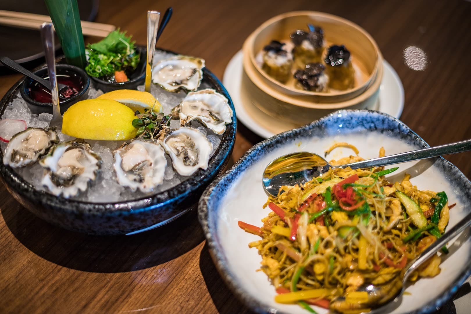 Oysters and noodles at Novikov Miami