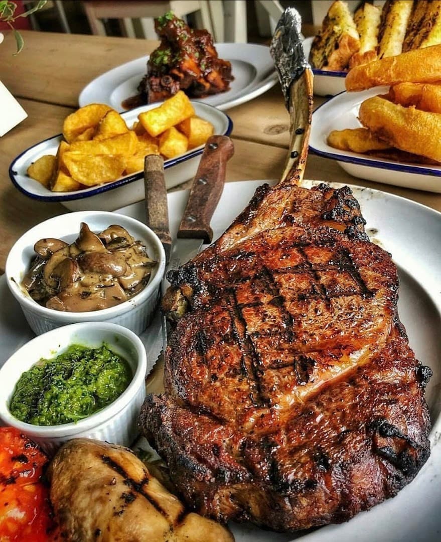 Delicious steak and sides at Nusr-Et Steakhouse Miami