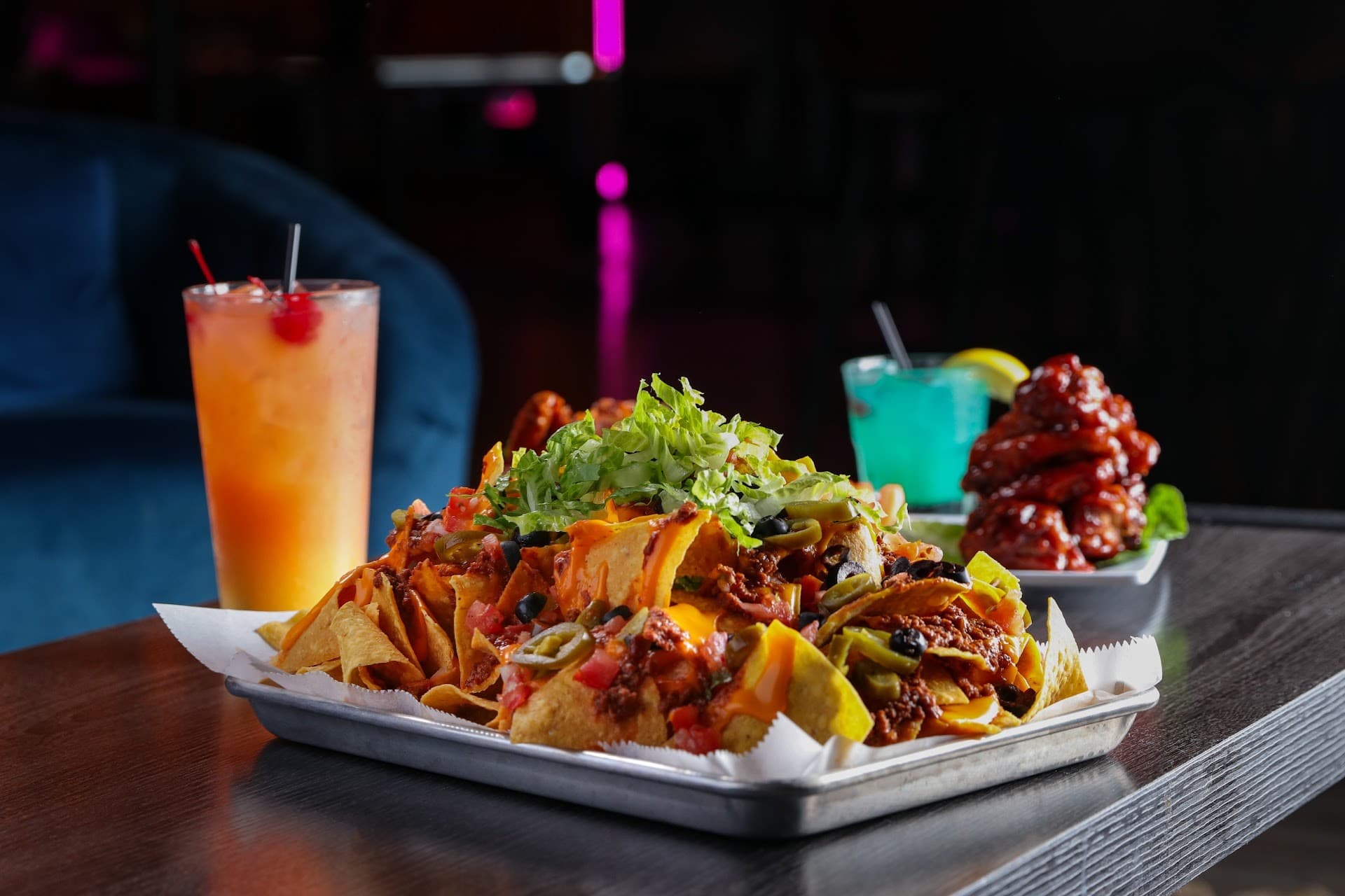 Delicious nachos and drinks at Off The Wall Kendall, Miami