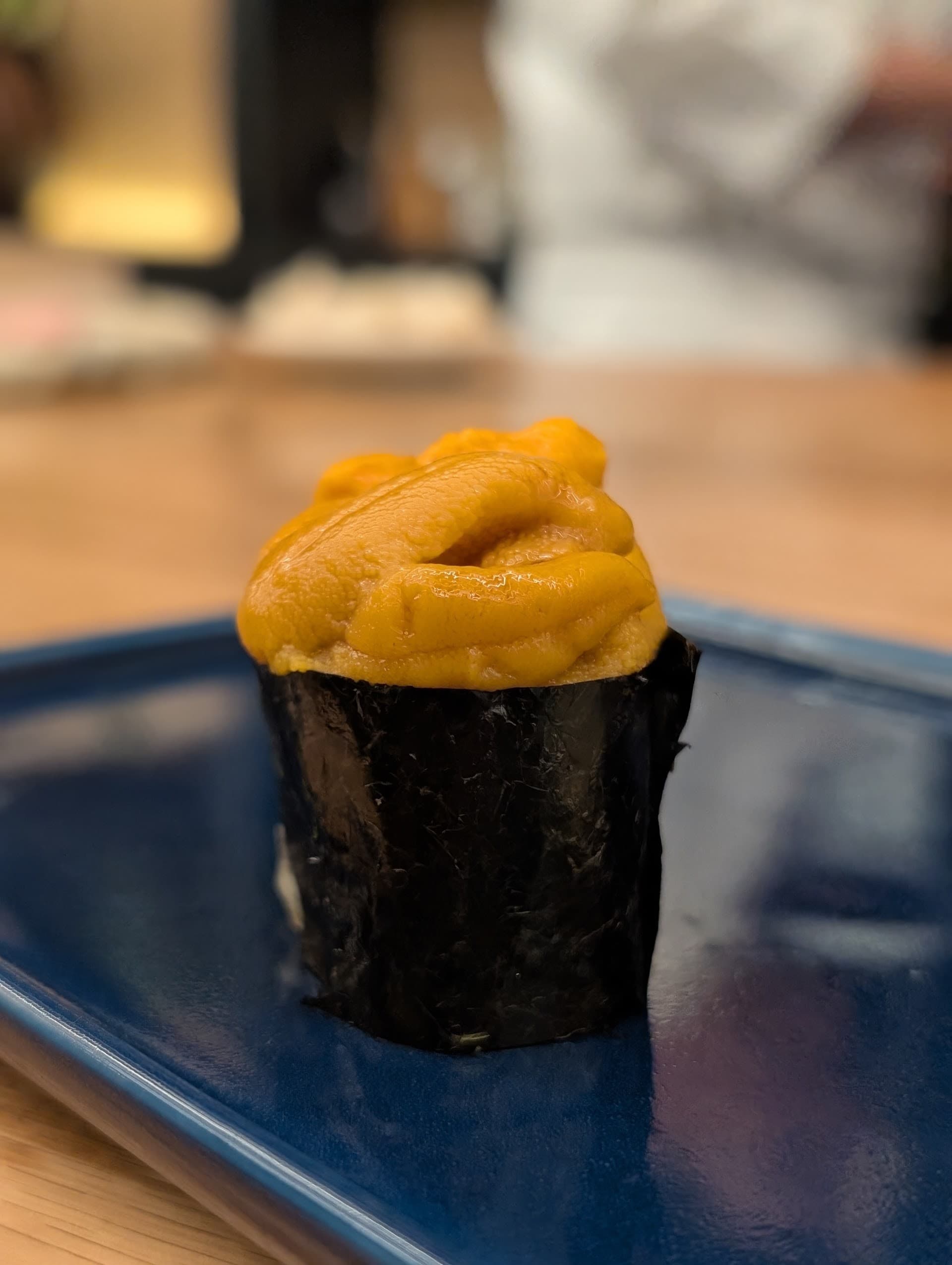 Sushi dish at Ogawa Miami featuring vibrant uni