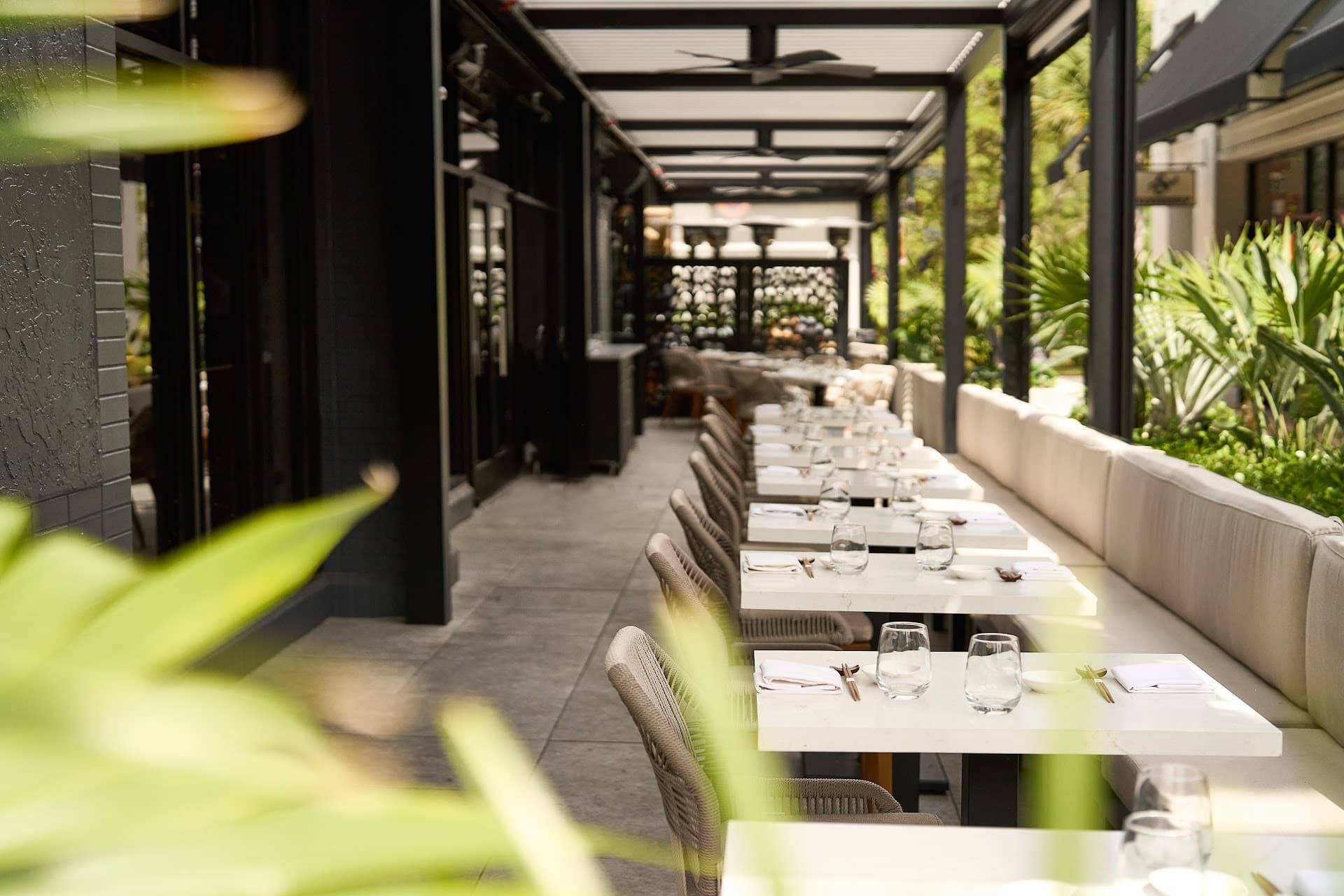 Outdoor dining area at OMAKAI sushi in Aventura