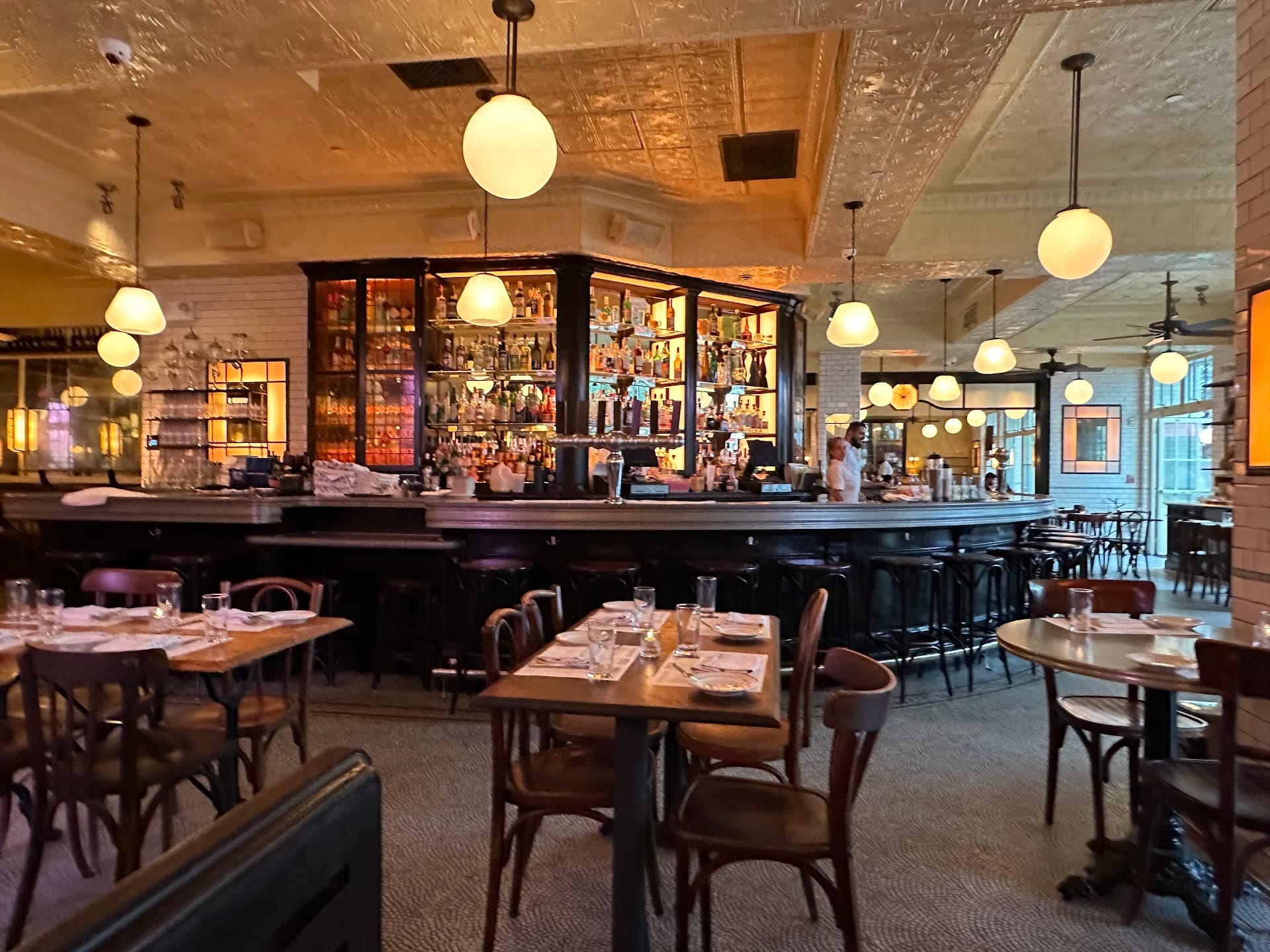 Pastis Miami interior ambiance with bar and seating