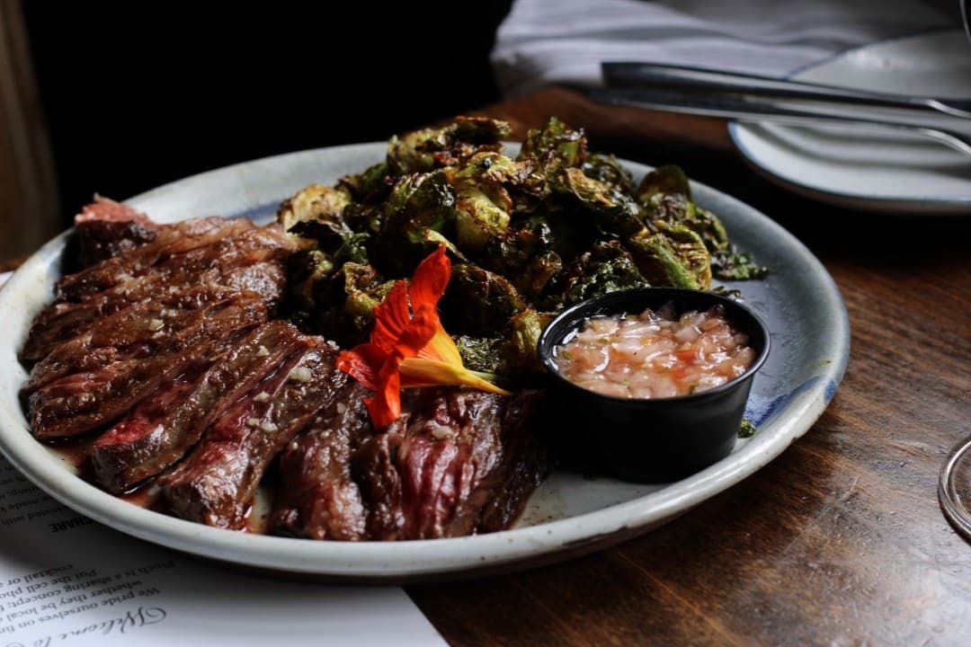 Delicious steak and Brussels sprouts at Pinch Kitchen+Bar in Miami
