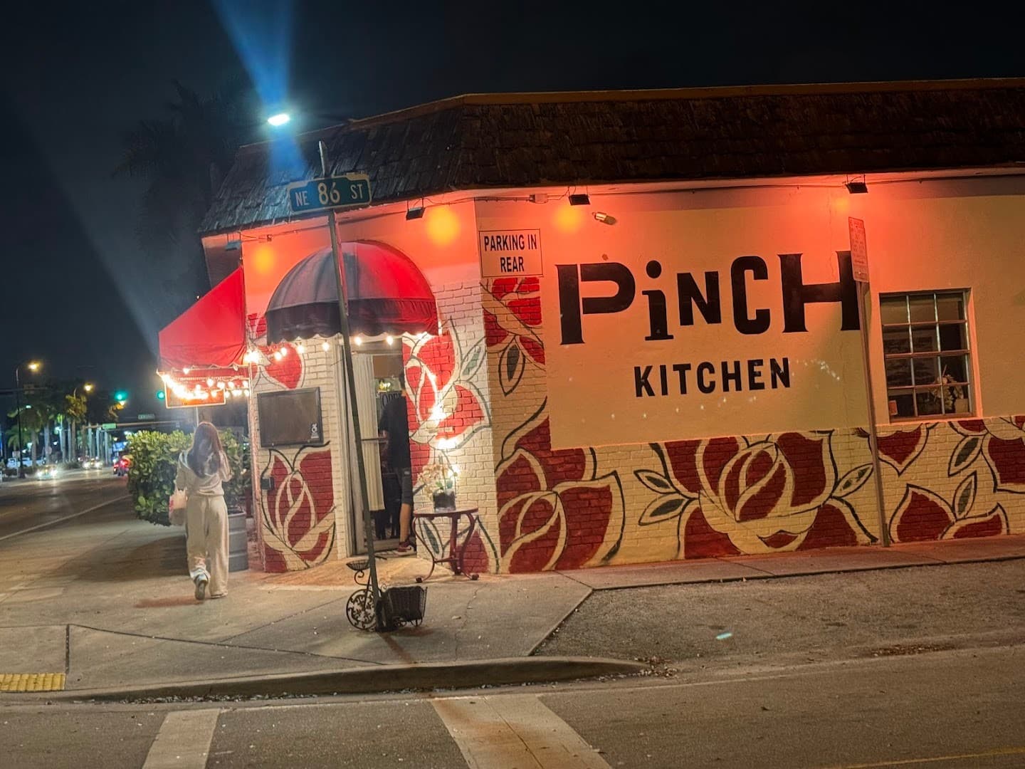 Pinch Kitchen exterior at night in Miami