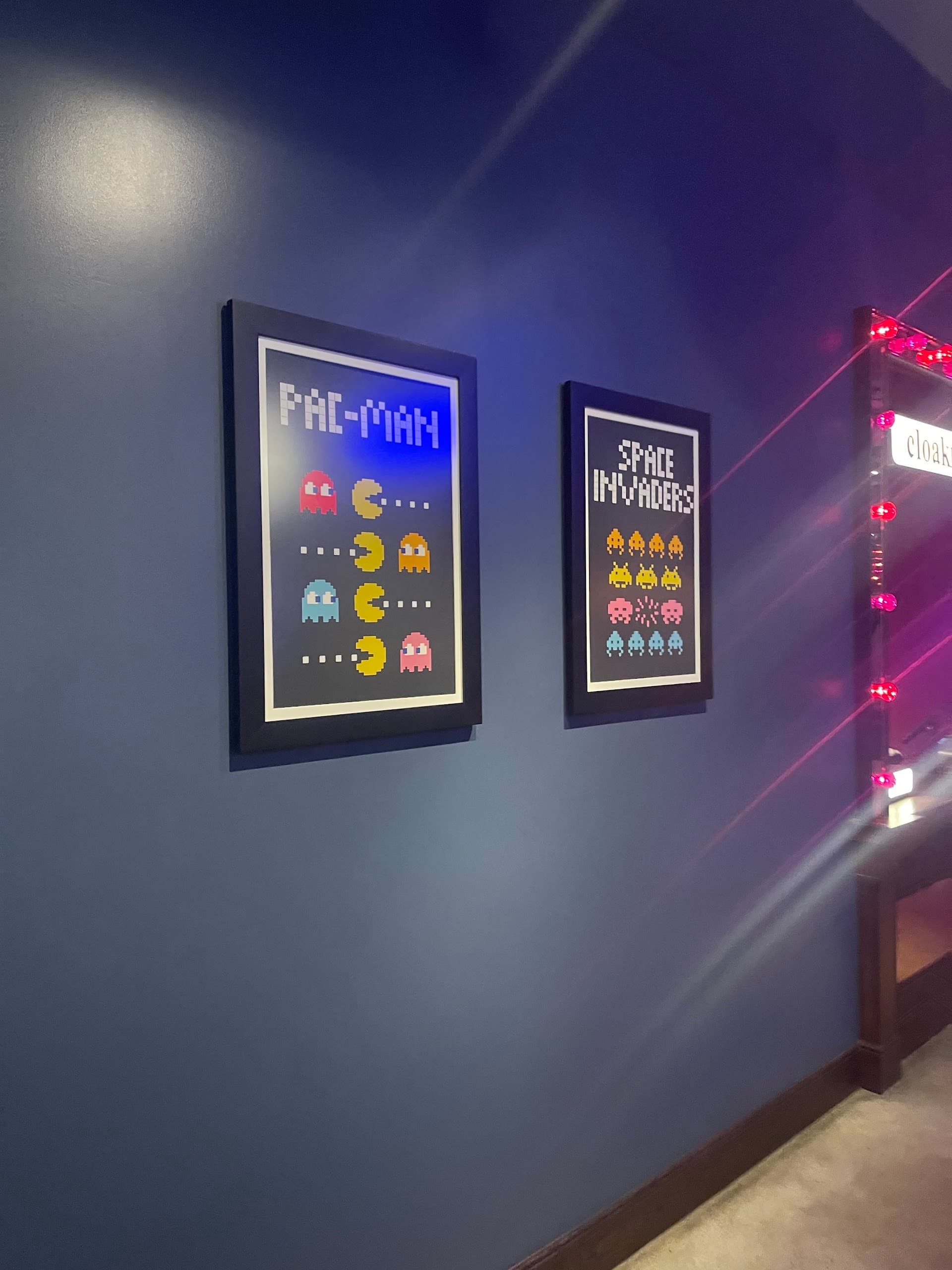 Pac-Man and Space Invaders artwork at Puttshack Miami, 701 S Miami Ave Level 4