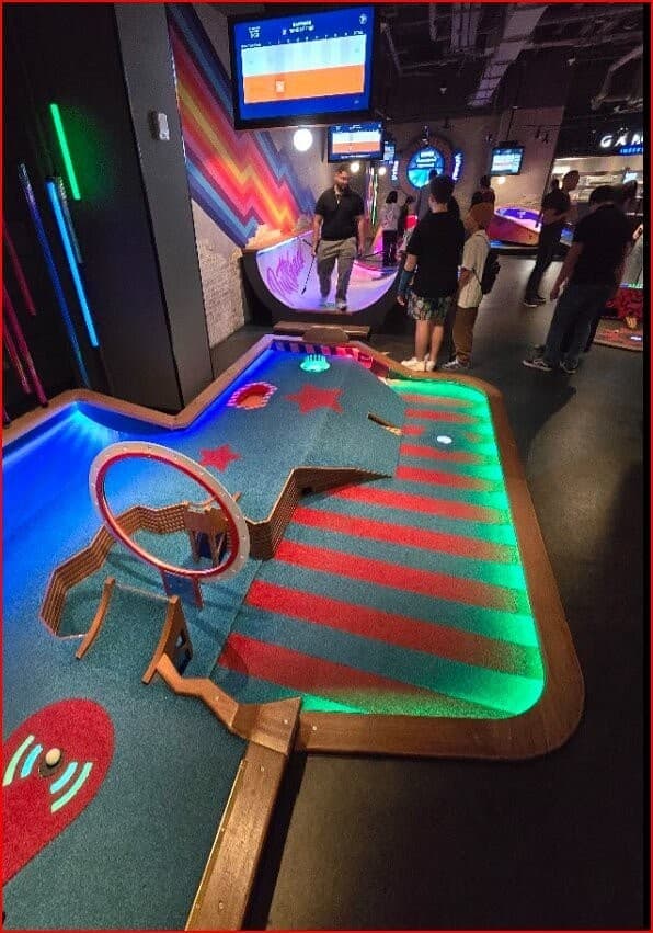 Puttshack mini golf experience at 701 S Miami Ave Level 4
