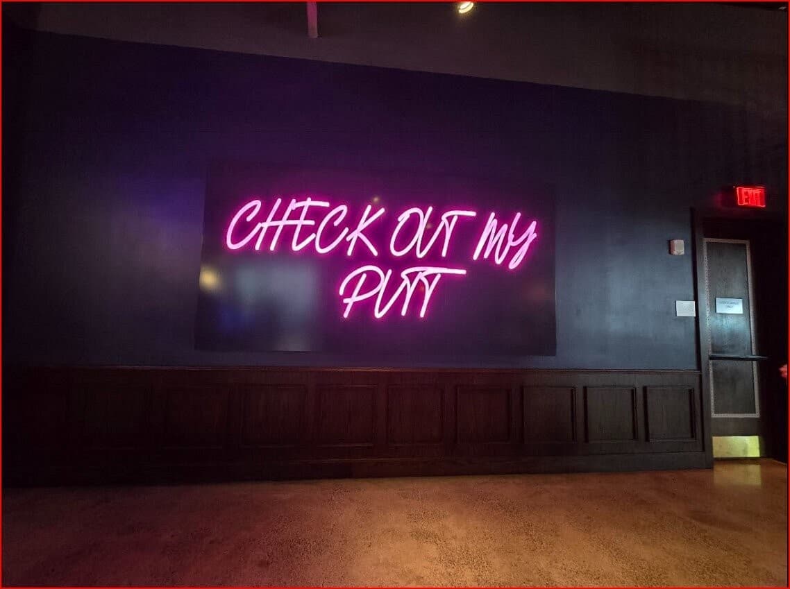 Neon sign at Puttshack Miami, 701 S Miami Ave Level 4