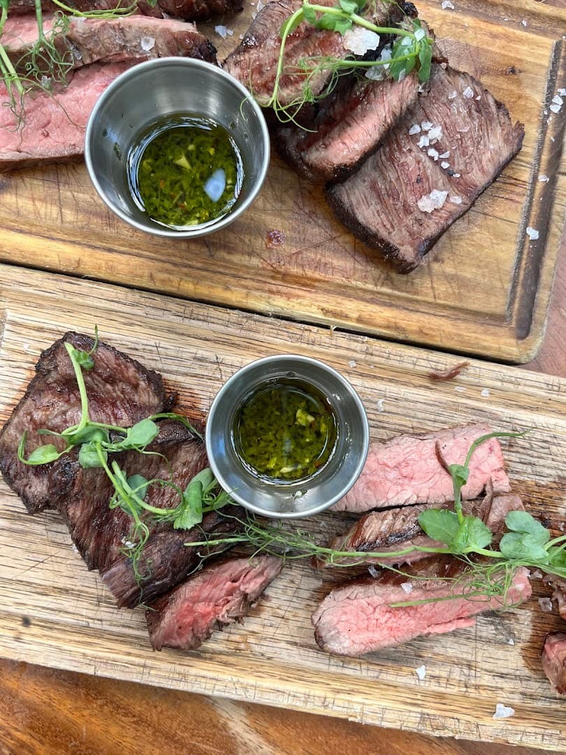 Grilled steak with chimichurri at Quinto Miami