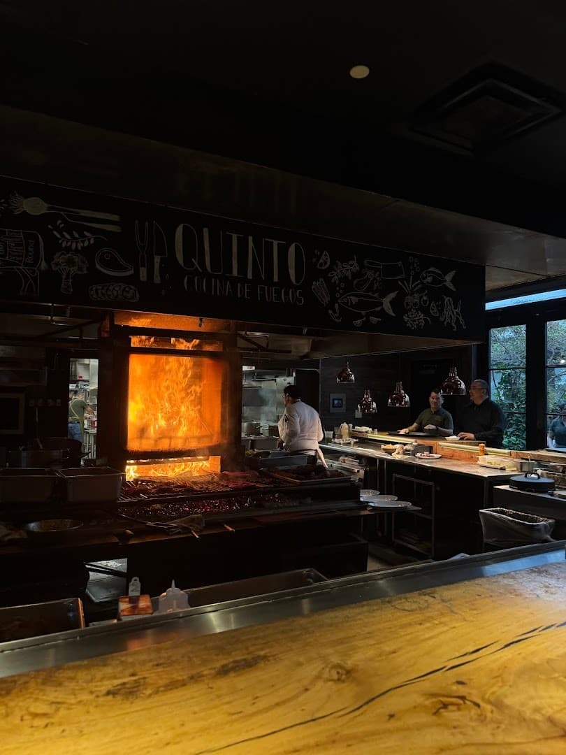 Quinto restaurant interior with open kitchen Miami