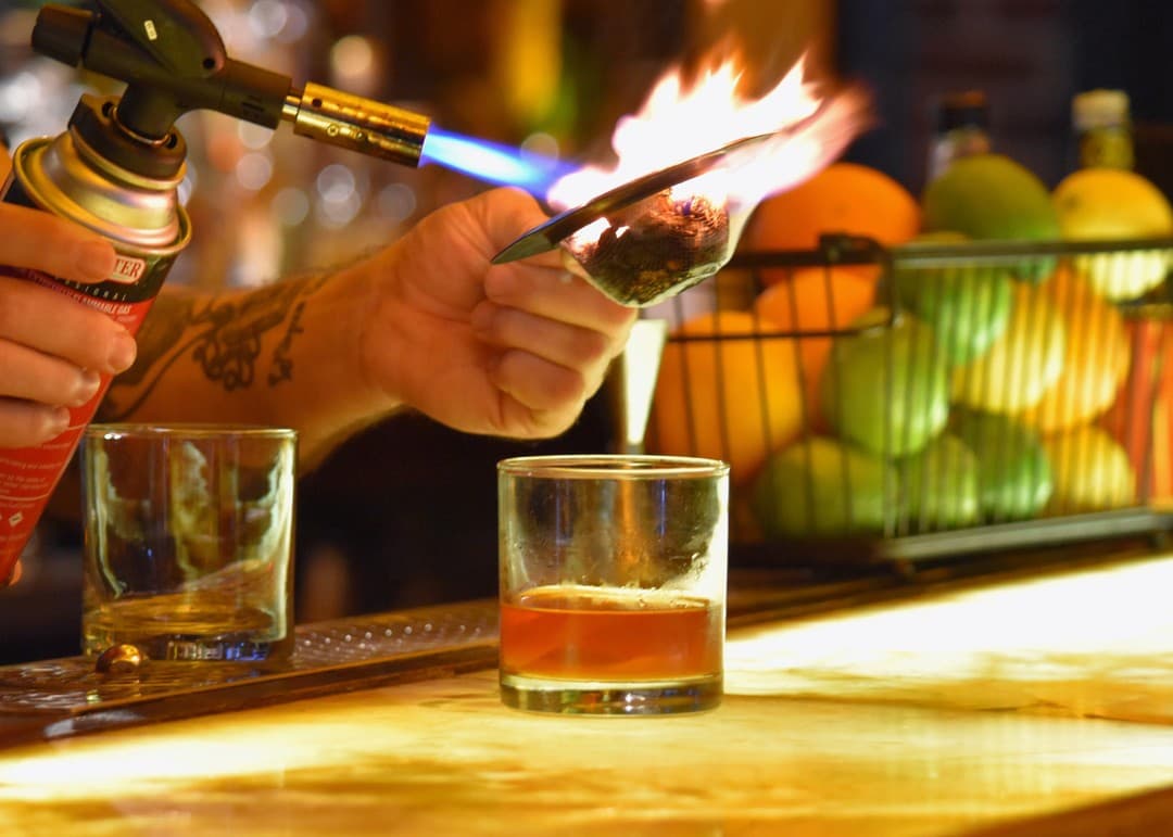 Cocktail preparation at Red Phone Booth in Miami