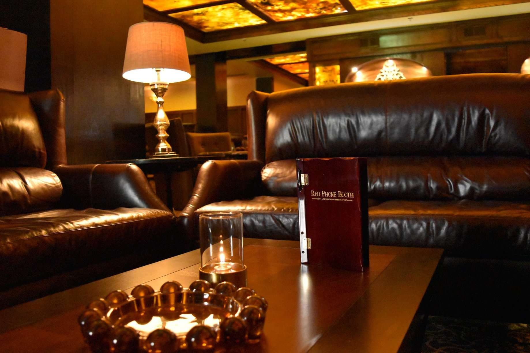 Cozy interior of Red Phone Booth bar in Miami