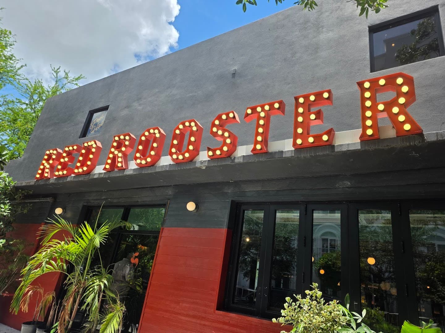 Red Rooster Overtown restaurant sign in Miami