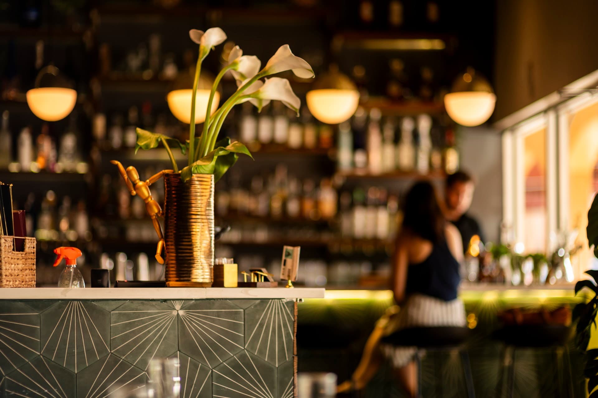 Reunion Ktchn Bar interior with floral decor in Aventura