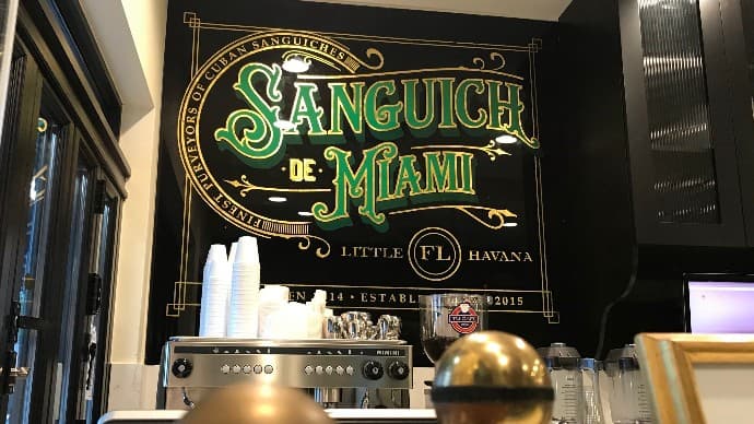 Sanguich de Miami interior decor showcasing signage