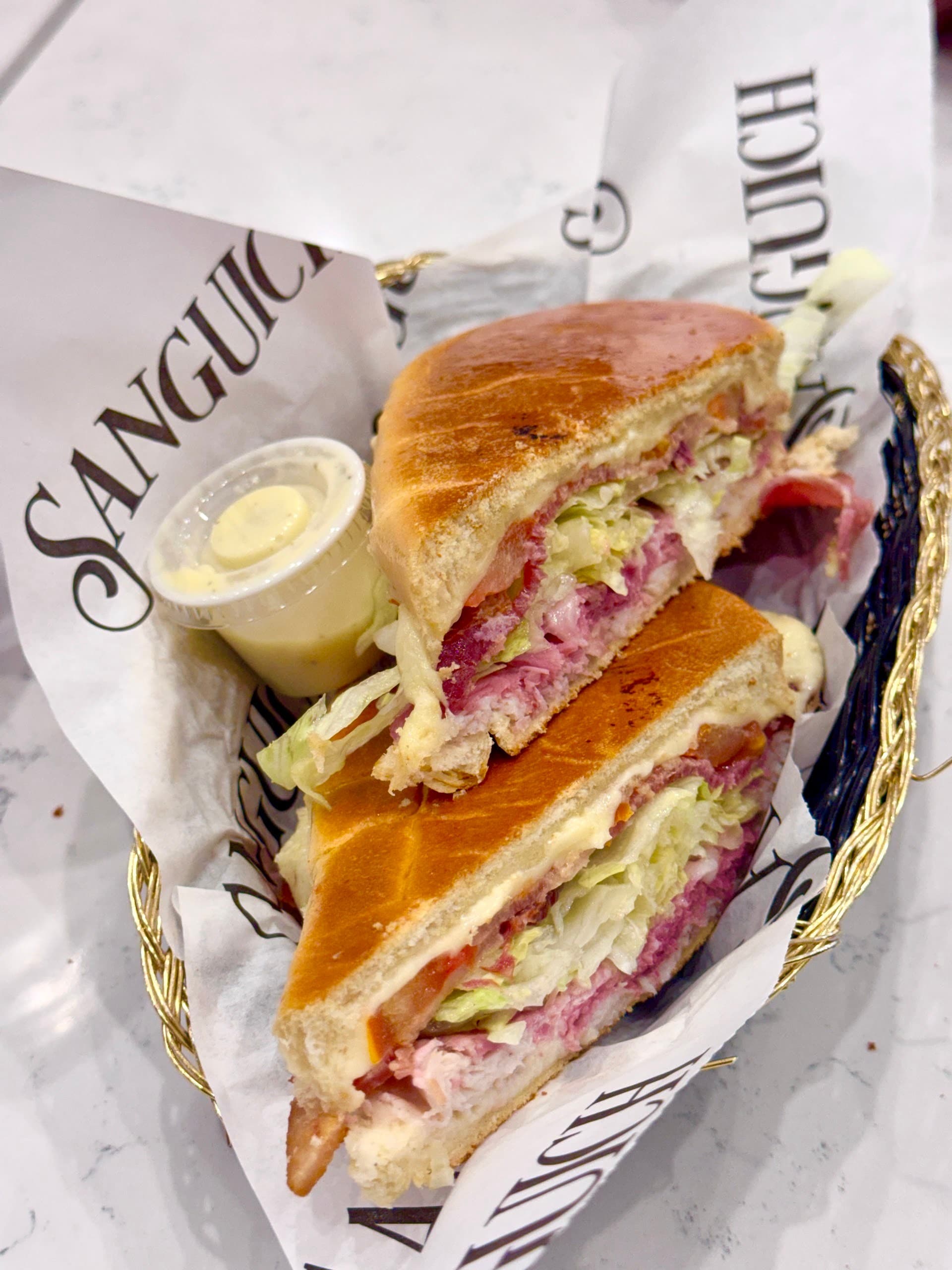 Sanguich sandwich showcasing Miami's culinary delights