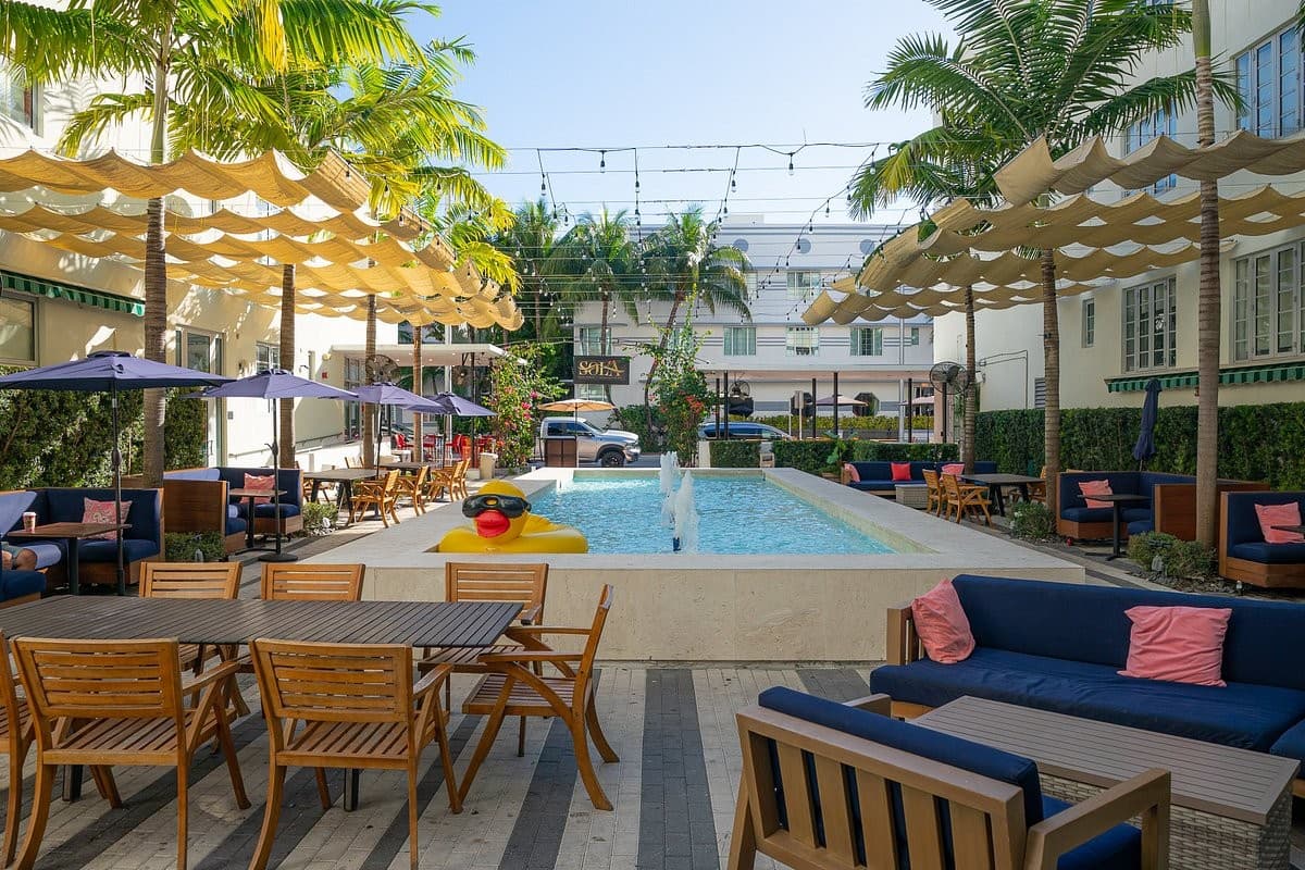 Sola Miami Beach outdoor seating area with pool