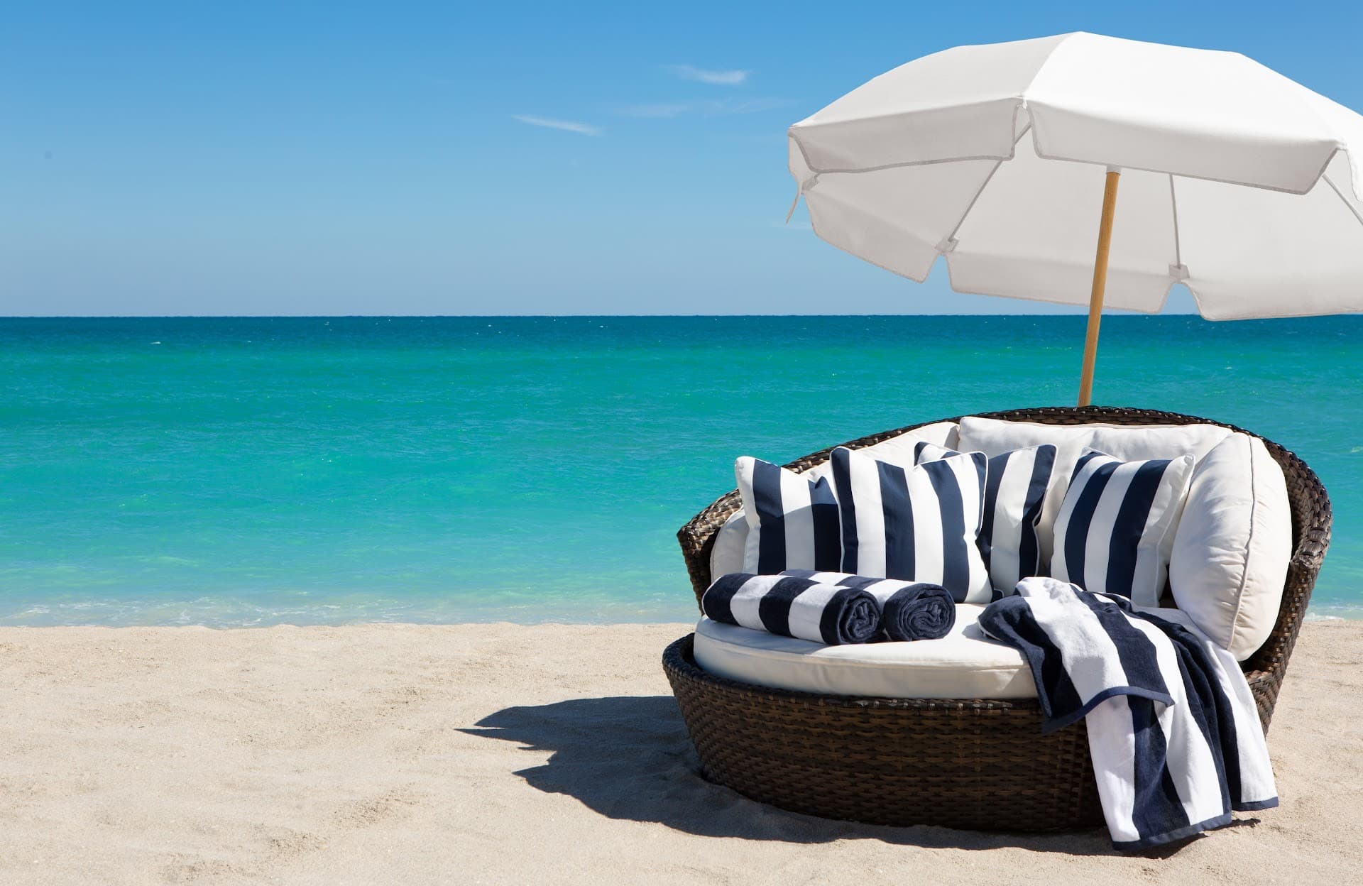 Cozy beach lounge at Solé Miami, A Noble House Resort, Sunny Isles Beach