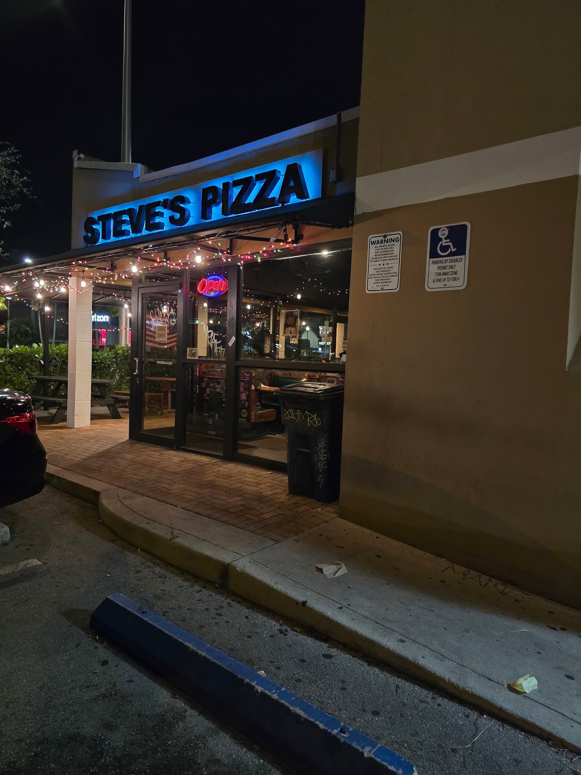 Steve's Pizza restaurant exterior in Miami at night