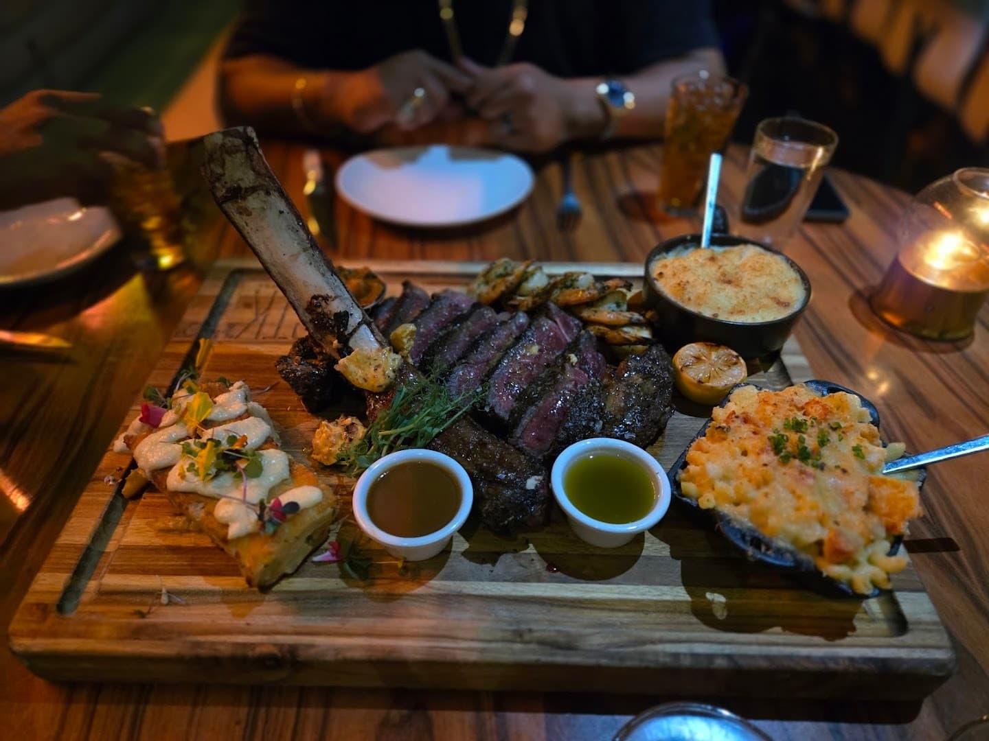 Delicious steak and sides at STK Steakhouse Miami Beach