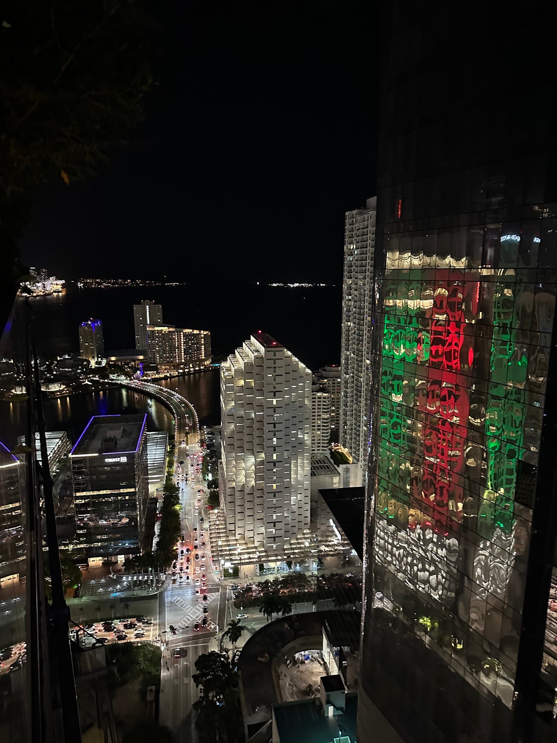 Night view of Sugar in Miami with city lights