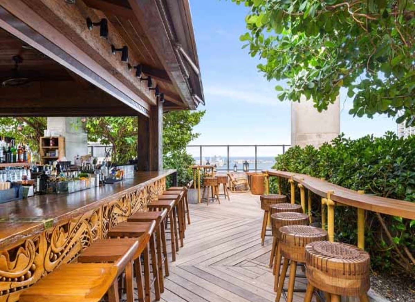 Patio scene at Sugar in Miami, overlooking the skyline