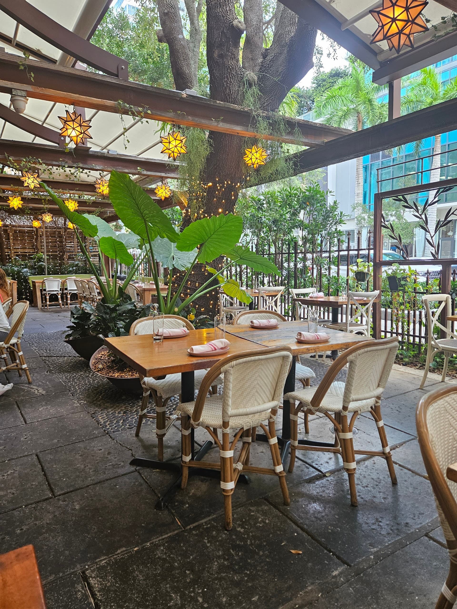 Interior view of SUGARCANE in Miami with lush decor