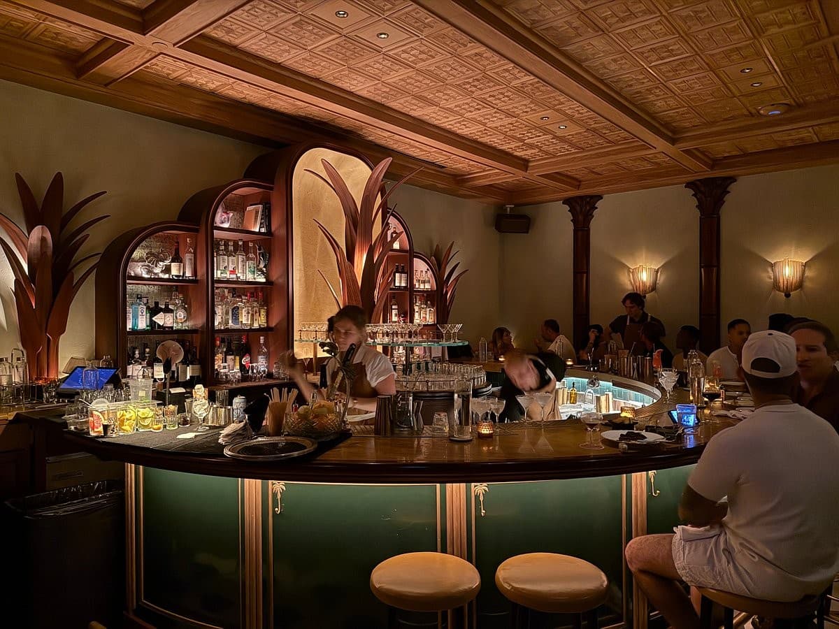 Bar at Sunny's Steakhouse in Miami with patrons