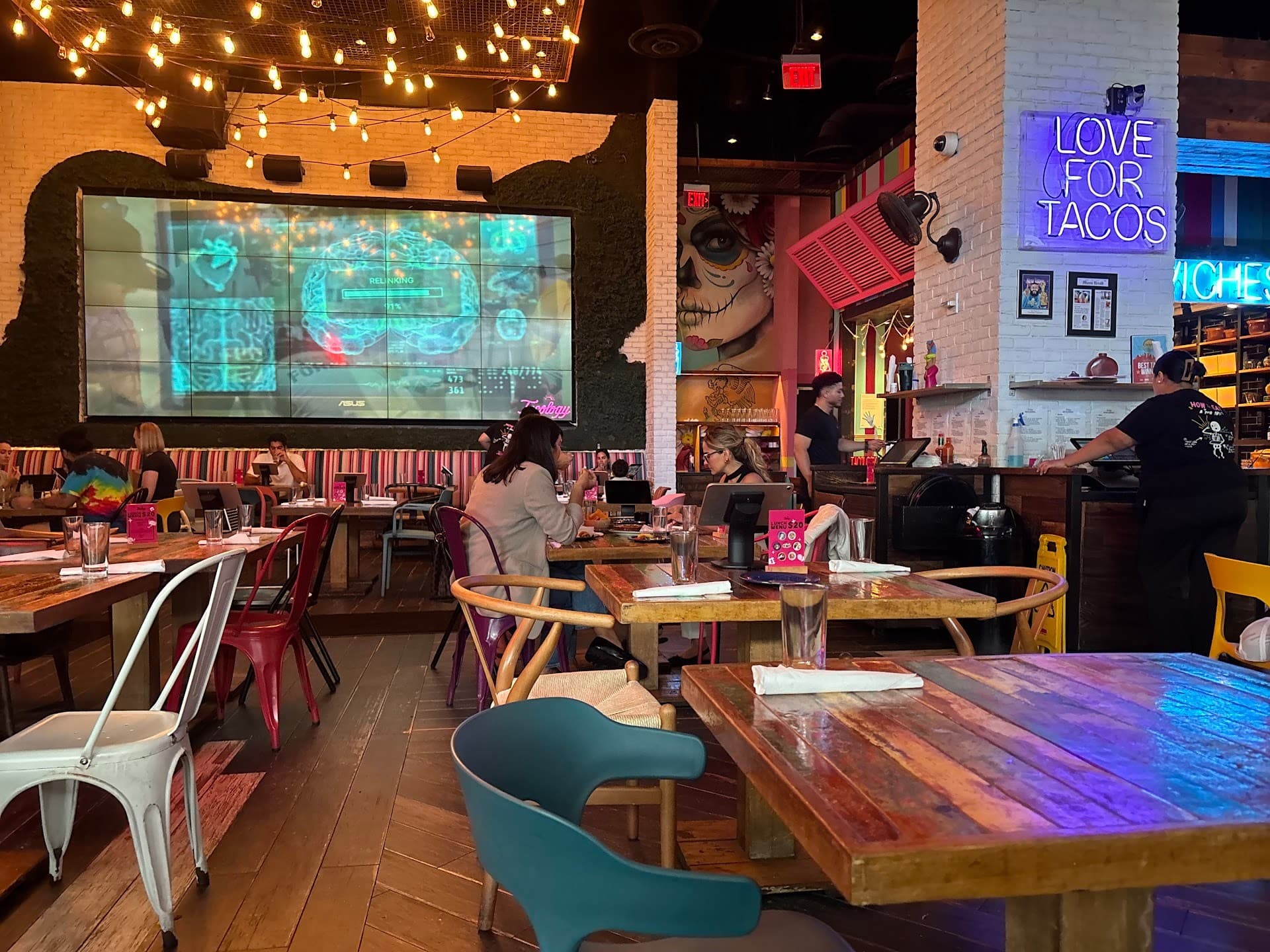 Vibrant interior of Tacology Brickell featuring decor.