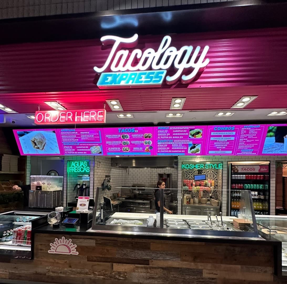 Tacology Brickell restaurant signage with menu