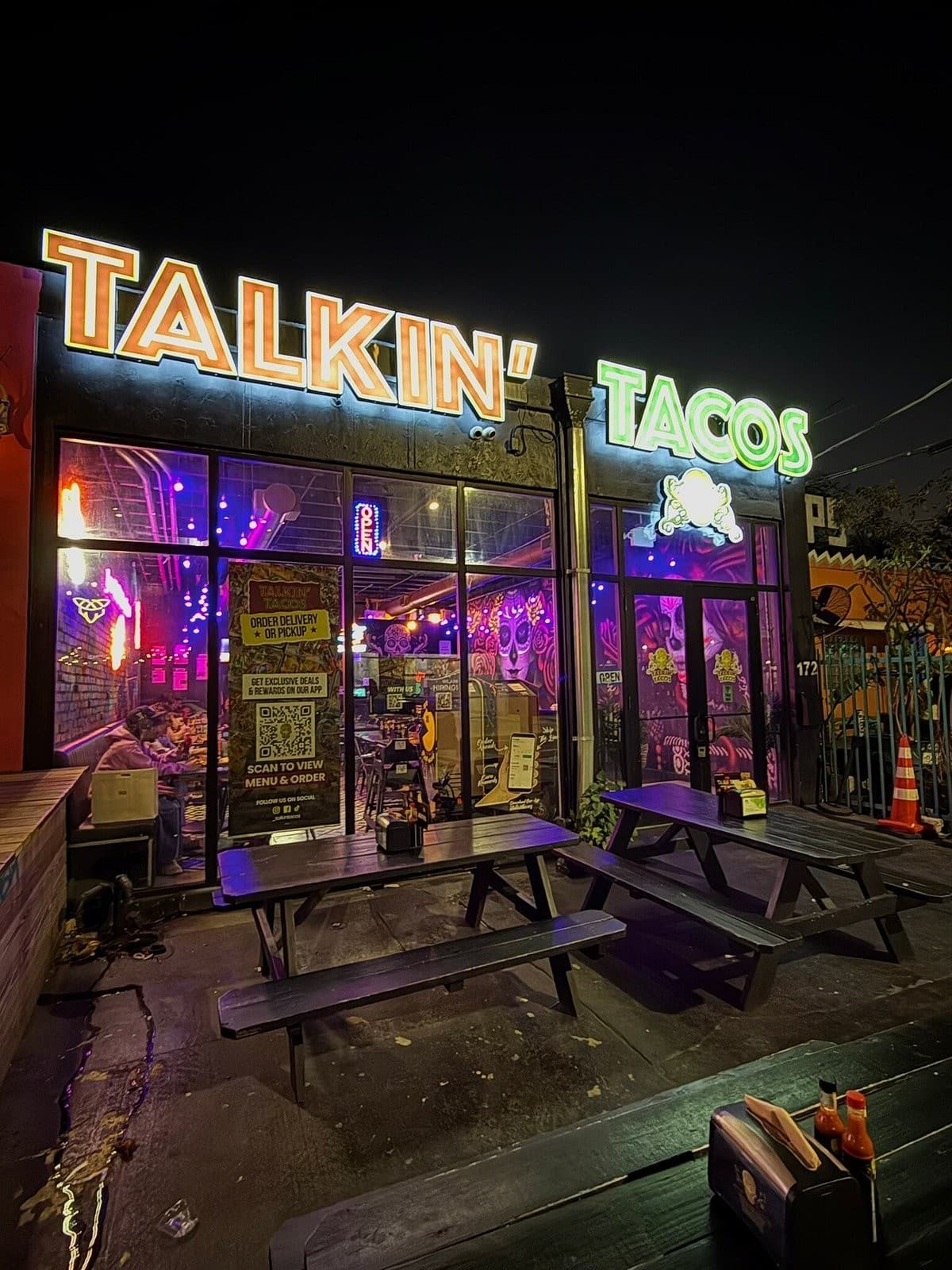Talkin' Tacos Wynwood restaurant exterior at night in Miami