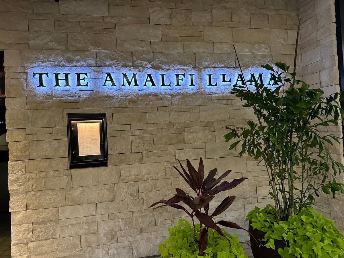 The Amalfi Llama restaurant sign at Suite 4150