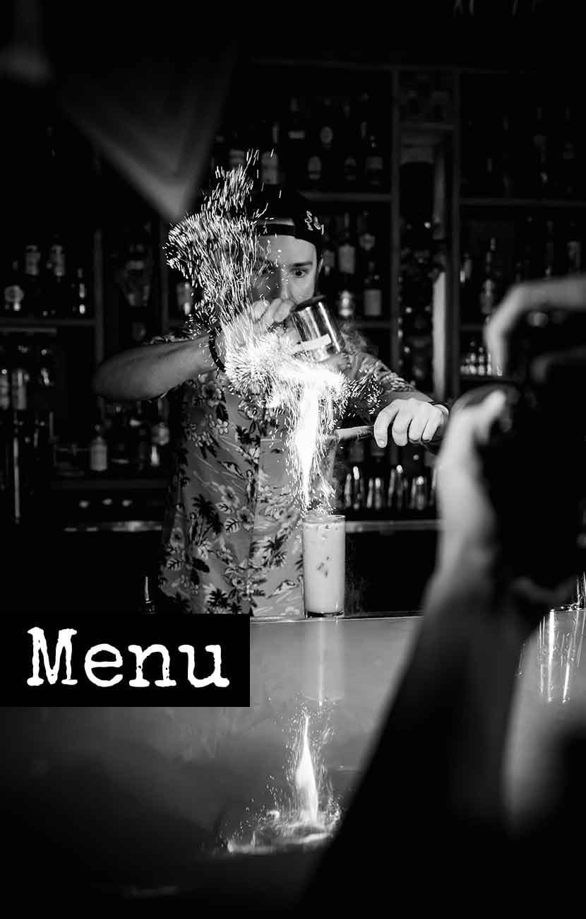 Bartender mixing drinks at The Dead Flamingo in Miami