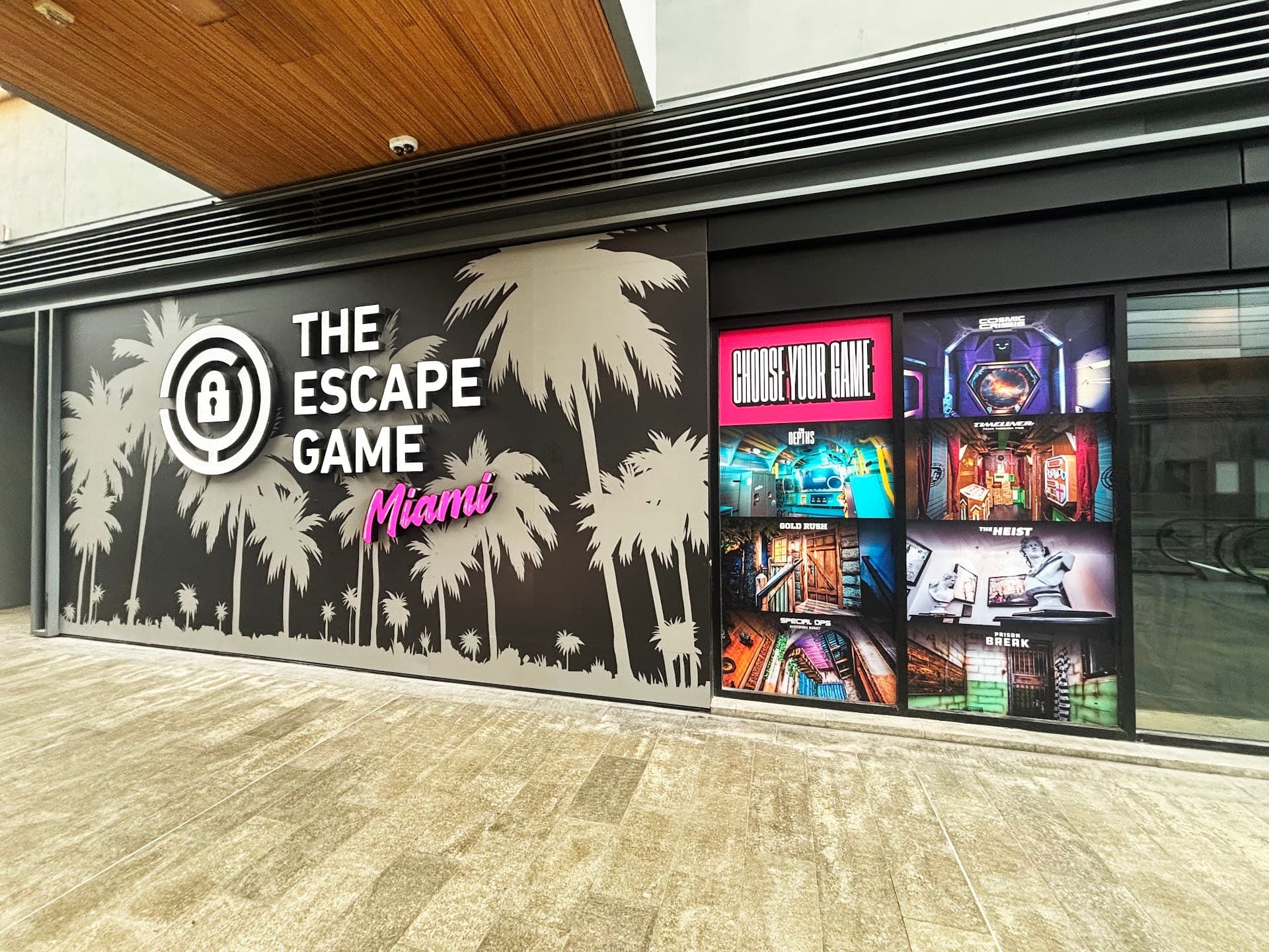 The Escape Game Miami signage with palm trees