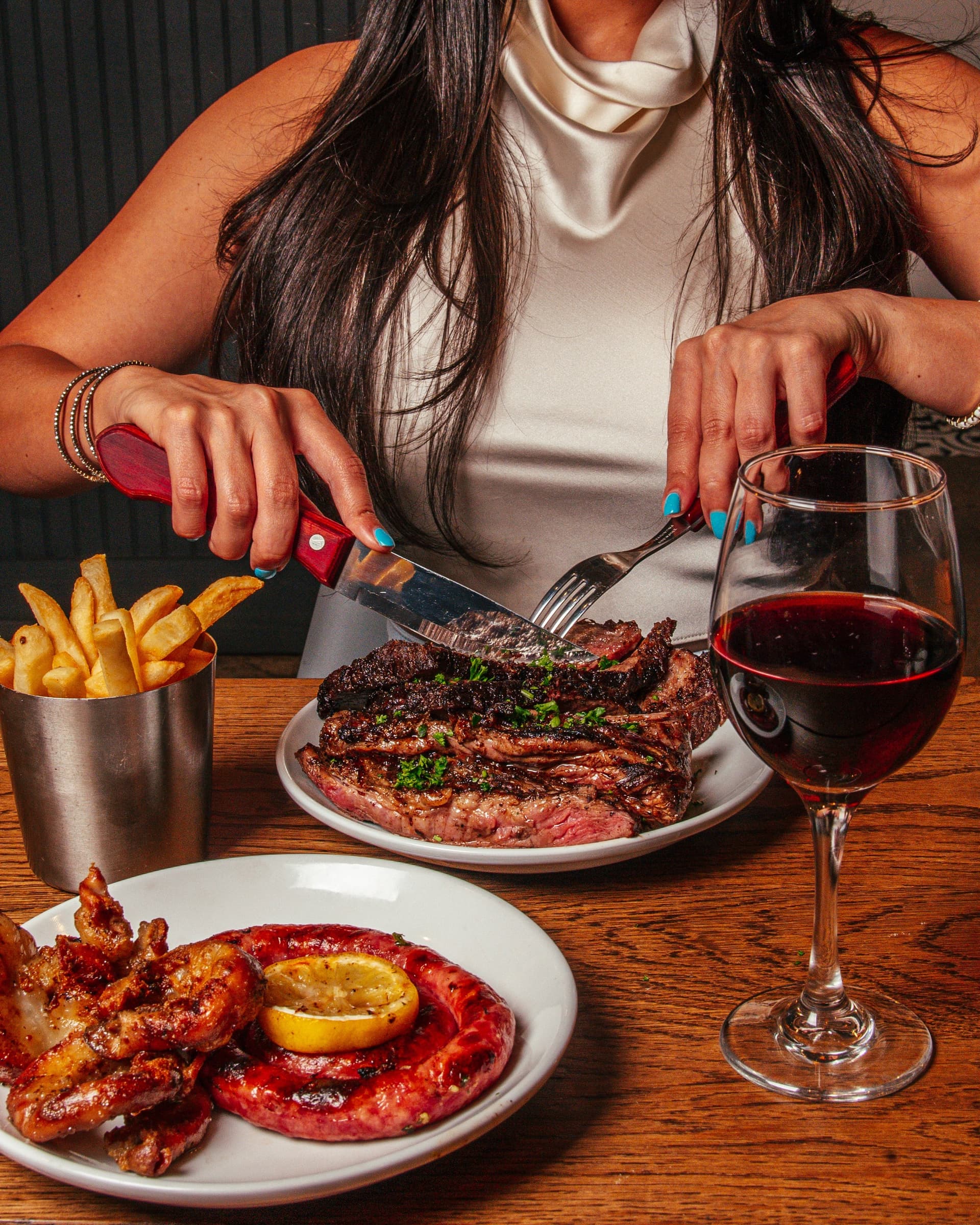 Dining scene at The Knife Parrilla Argentina in Doral