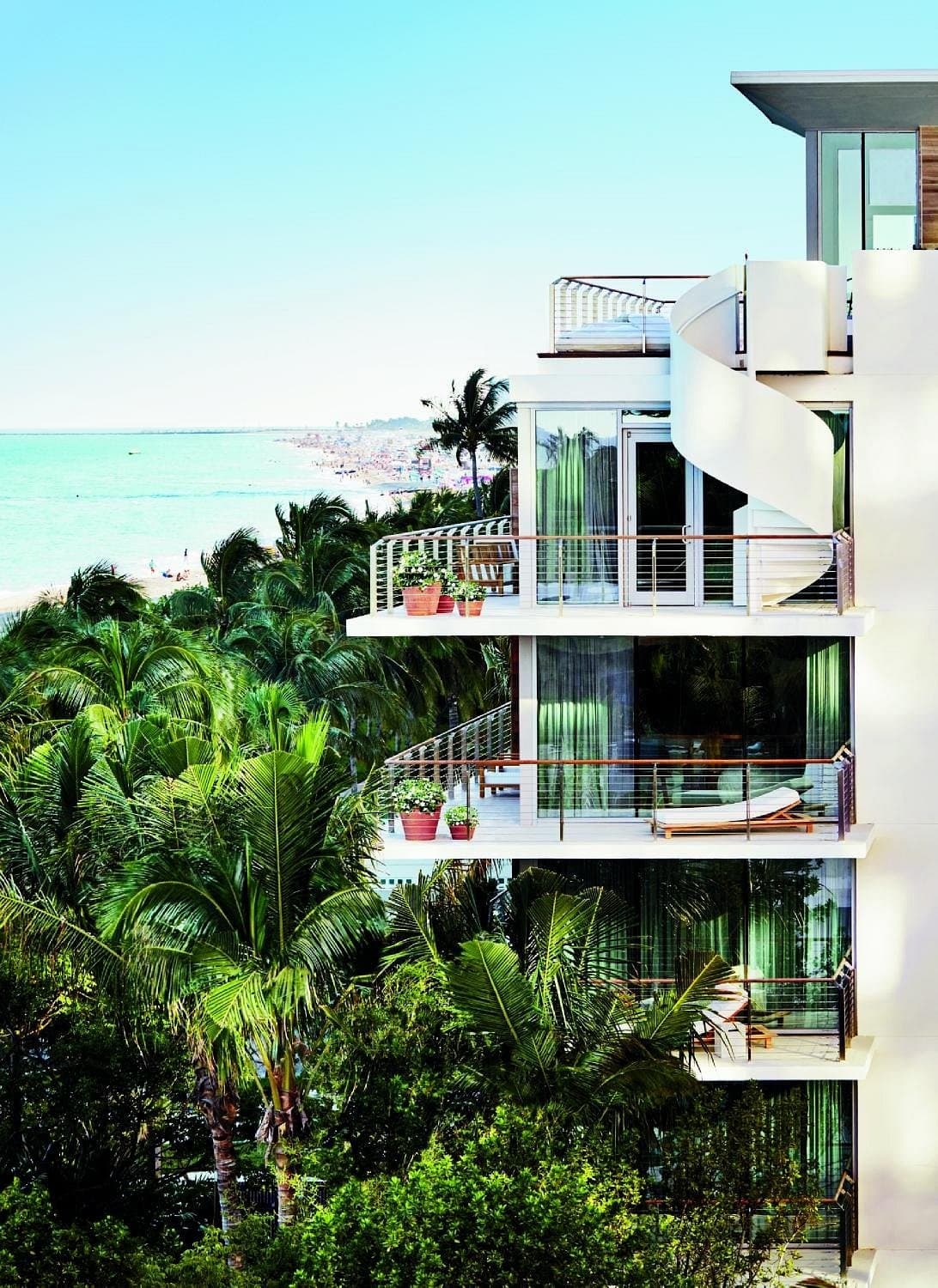 The Miami Beach EDITION view of beachfront and palm trees