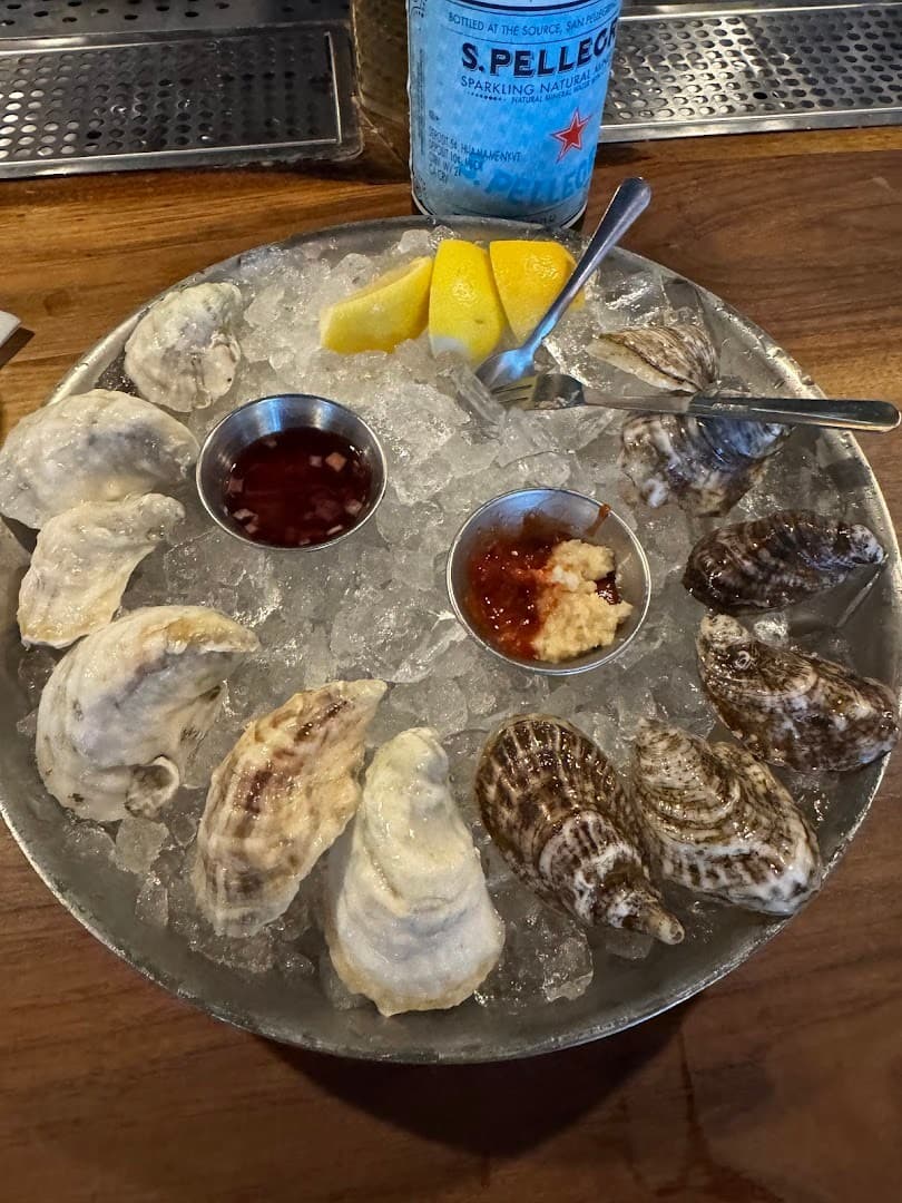 Oysters and sparkling water at The River Oyster Bar Miami