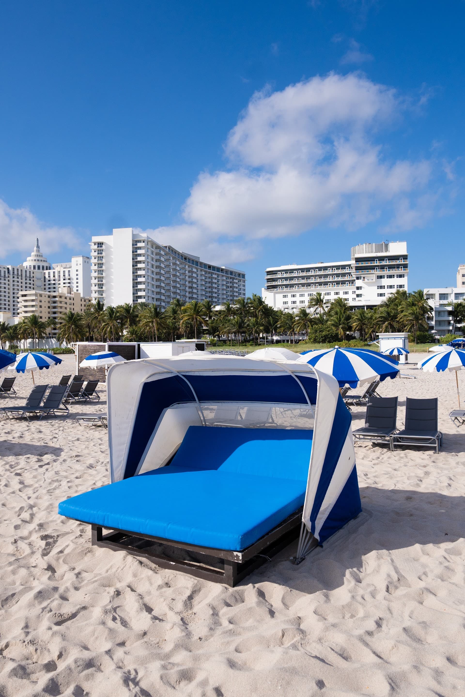 The Sagamore Hotel South Beach beachfront with cabana and blue sky, 1671 Collins Ave